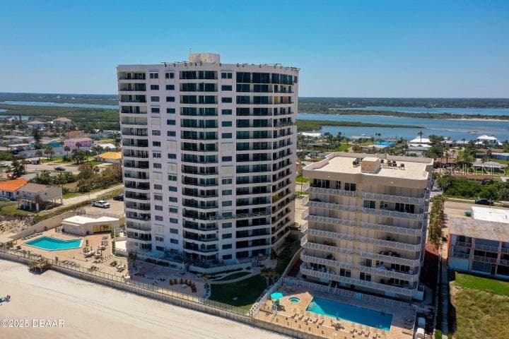 This well-maintained complex includes a beachside pool, and generous sundeck, all framed by uninterrupted ocean views. - 3855 S ATLANTIC AVE #401, DAYTONA BEACH