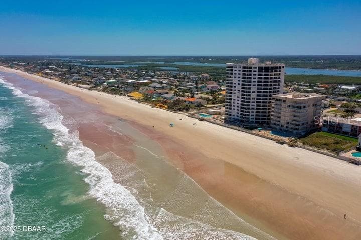 Enjoy the best of both worlds with sweeping vistas of the coastline to the south and charming neighborhood surroundings inland. - 3855 S ATLANTIC AVE #401, DAYTONA BEACH