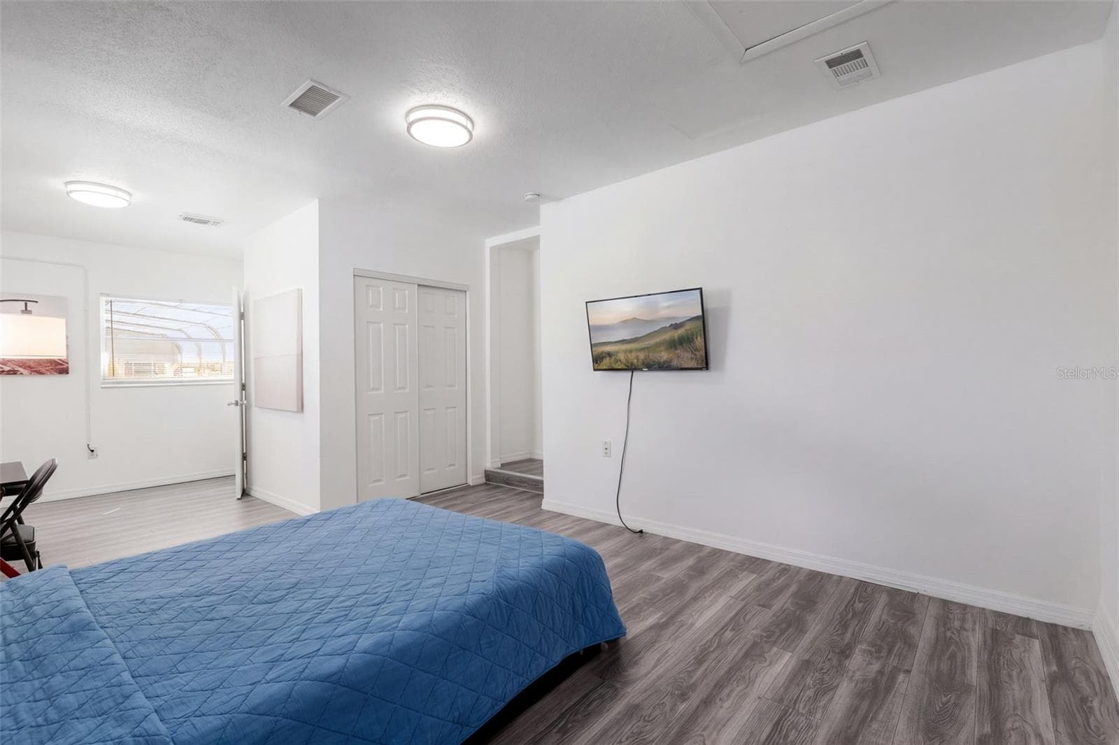 Primary bedroom with ensuite bathroom - 8205 ESPERANZA ST, ORLANDO
