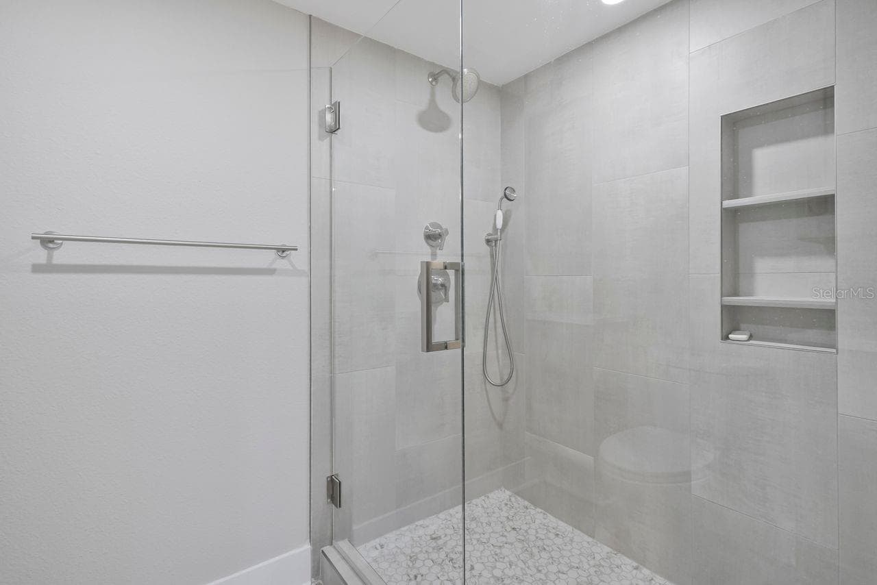 Primary bath shower - 7645 SUN ISLAND DR S #101, SOUTH PASADENA