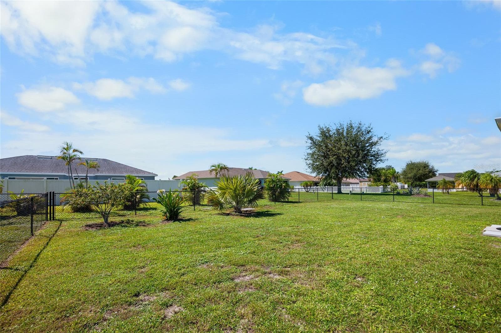 fully fenced back yard - 6279 COLISEUM BLVD, PORT CHARLOTTE