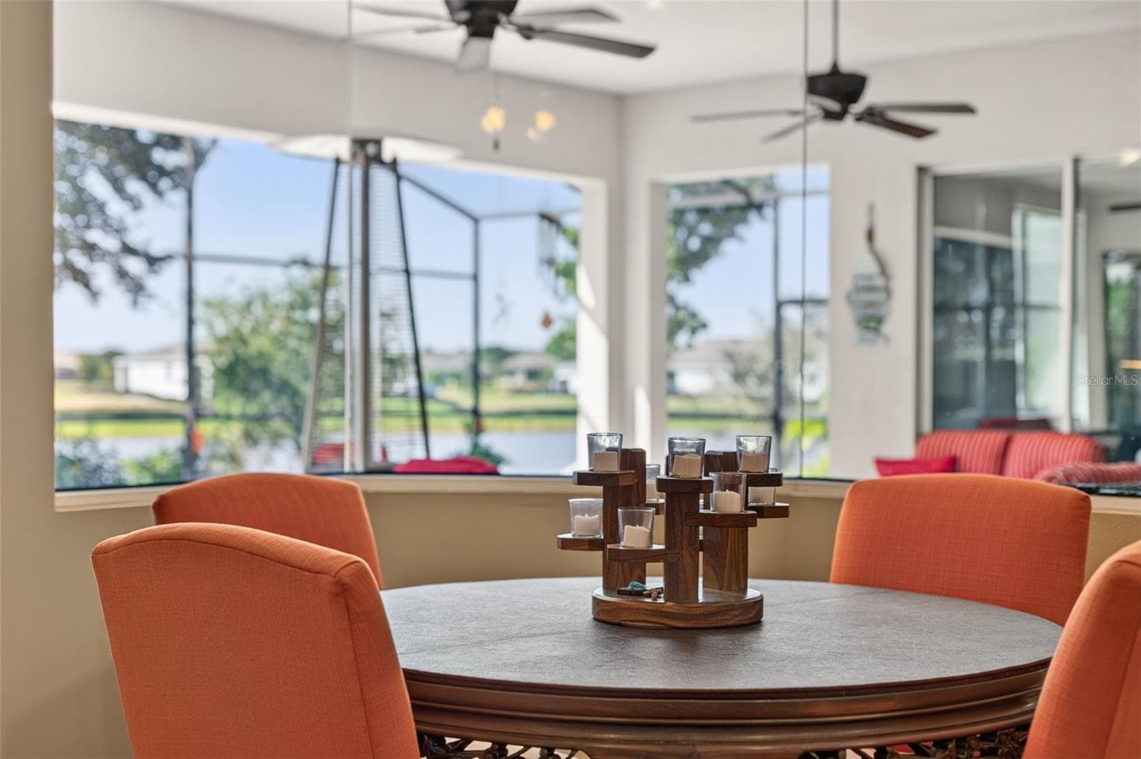 Savor tranquil mornings by the water—the perfect setting to enjoy your morning coffee alongside picturesque lake views. - 2444 PAWTUCKET PASS, MOUNT DORA