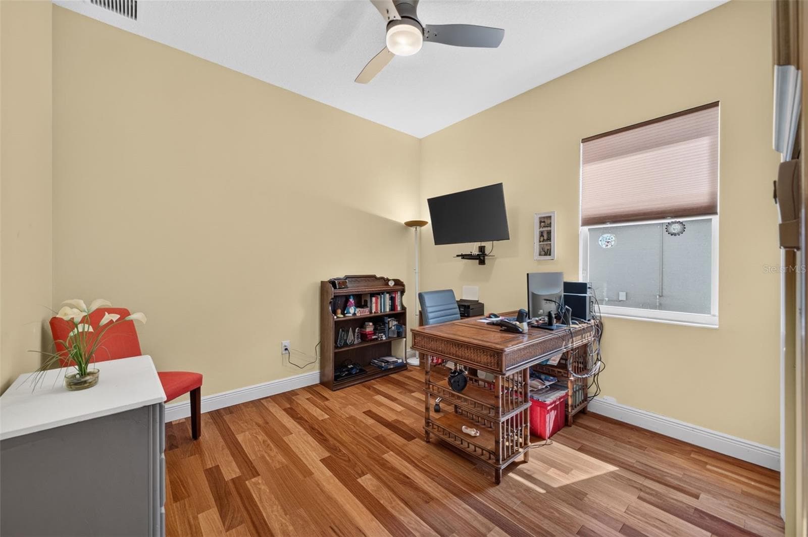 Offering versatile living space, the second bedroom functions beautifully as a quiet home office or a spacious guest retreat. - 2444 PAWTUCKET PASS, MOUNT DORA