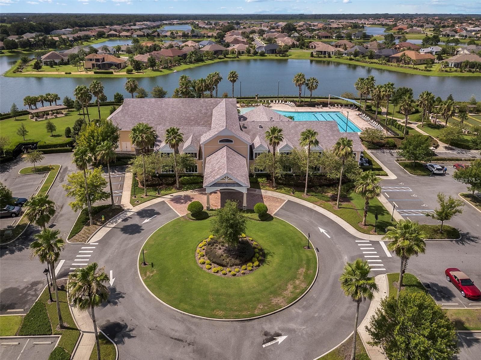 Residents enjoy access to a grand 18,000 sq. ft. clubhouse, serving as the vibrant hub for community social events, activities, and recreation. - 2444 PAWTUCKET PASS, MOUNT DORA