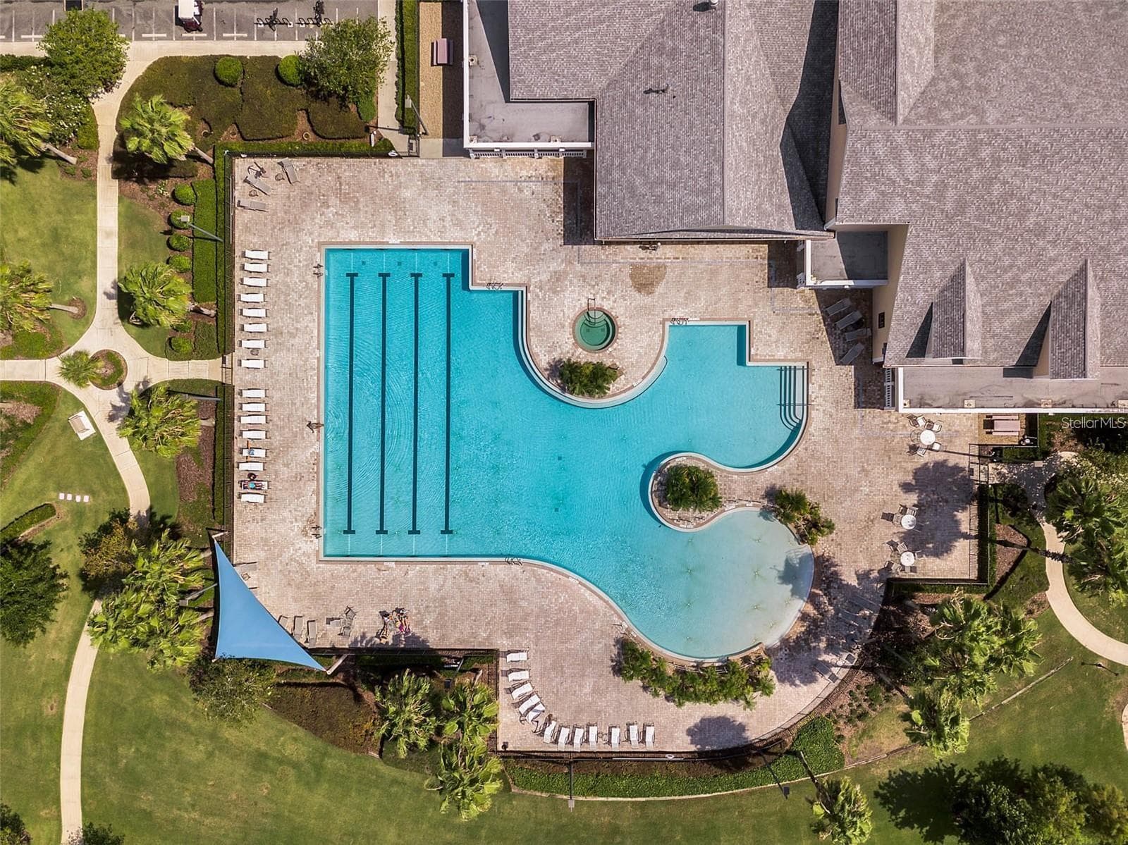 Unwind at the community's heated, resort-style pool—a serene oasis designed for relaxation, swimming laps, or lounging under the sun. - 2444 PAWTUCKET PASS, MOUNT DORA