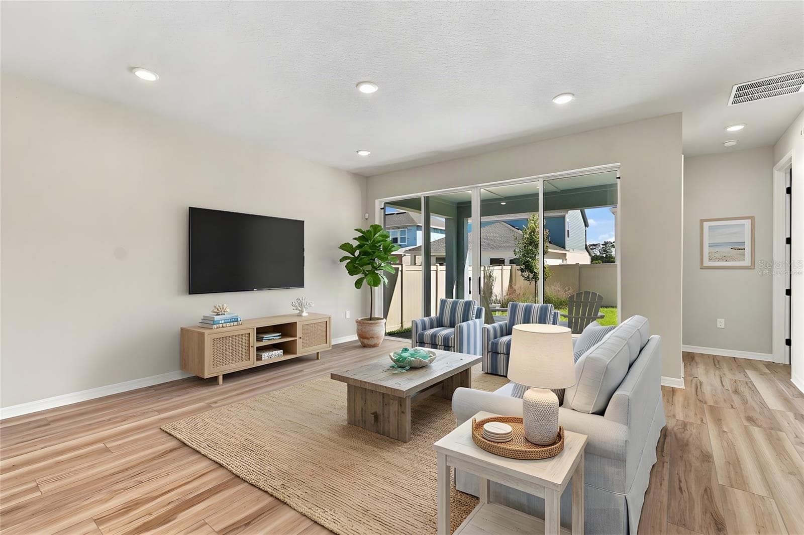 Family Room **Virtually Staged - 5825 NATIVE OAK ST, MOUNT DORA