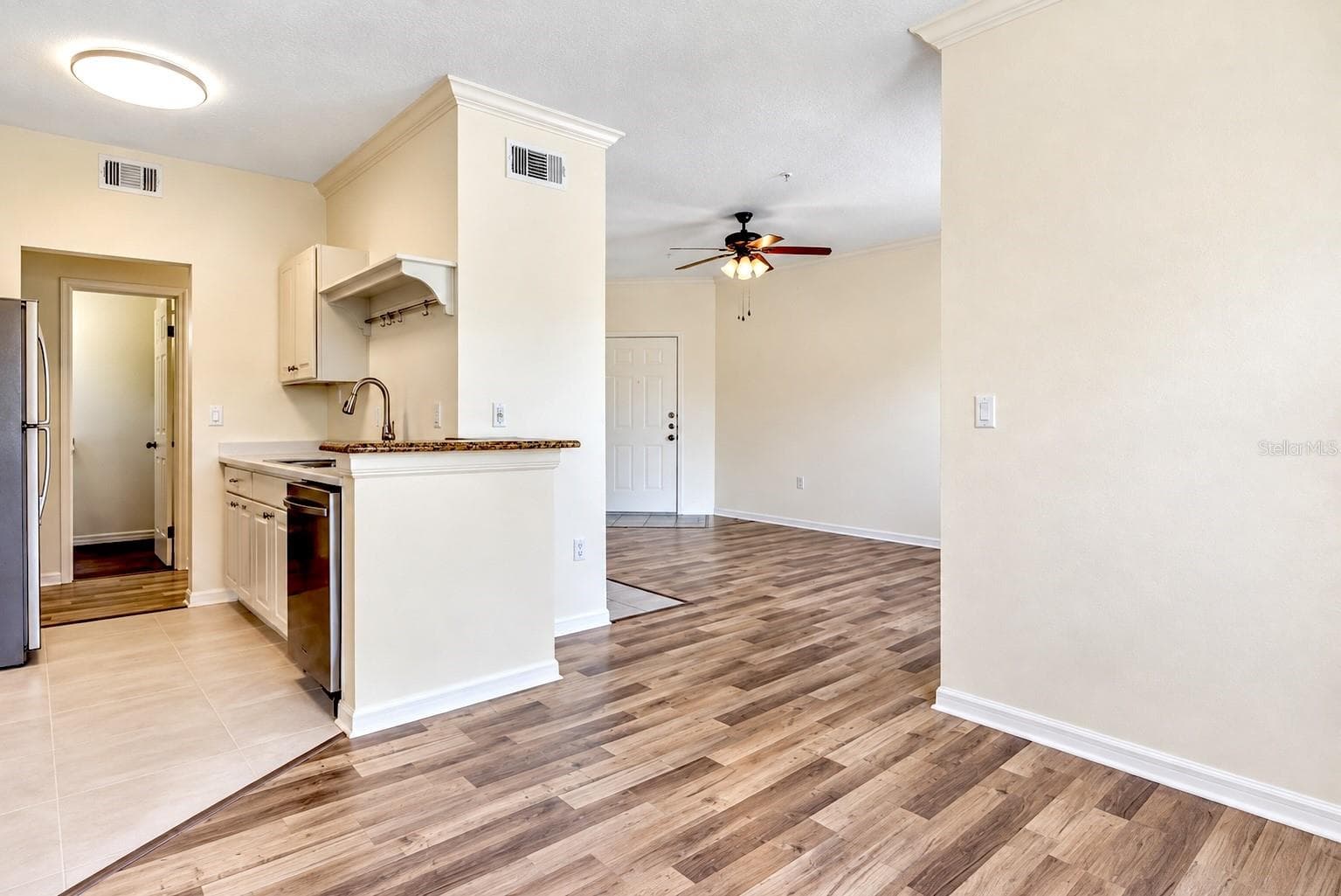 Dining room / Kitchen/ Living room - 2558 ROBERT TRENT JONES DR #1434, ORLANDO