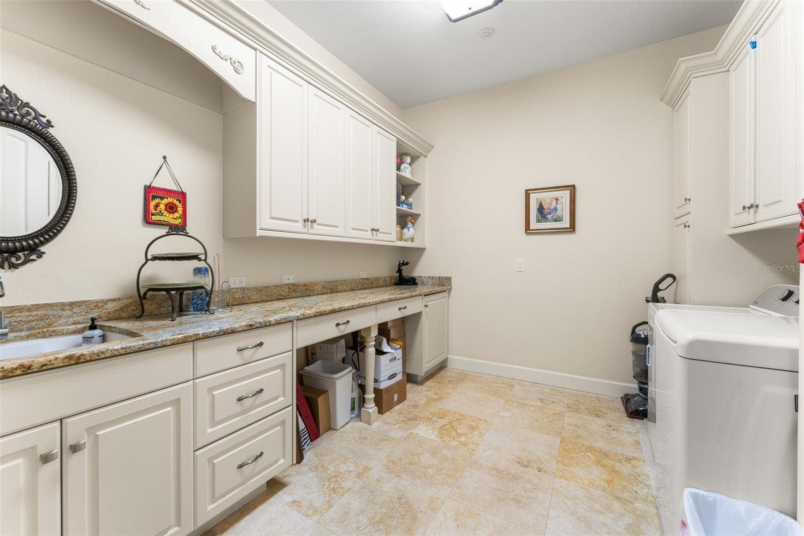 Laundry room with sink and shelving - 9691 NW 53RD DR, GAINESVILLE