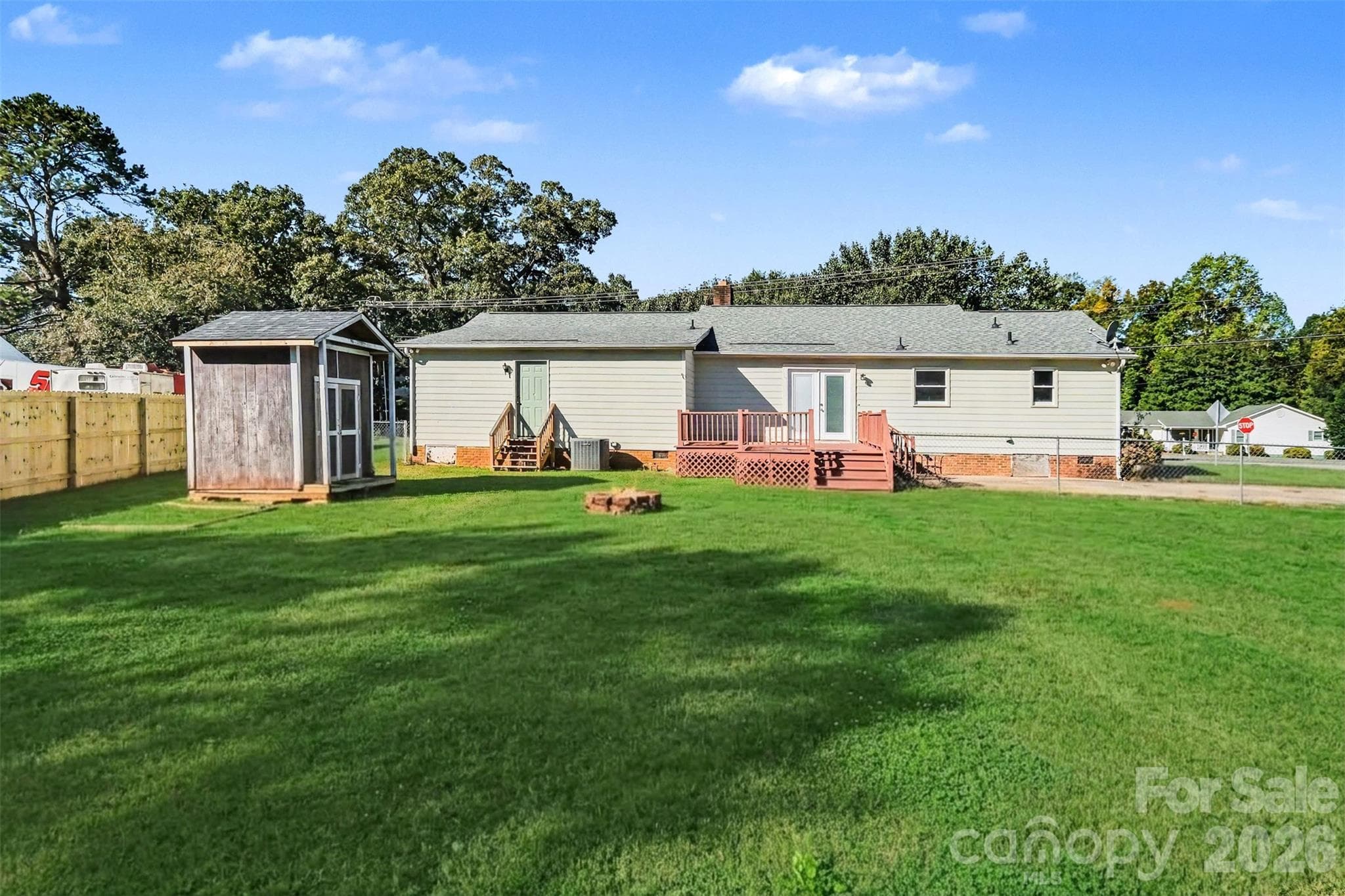Yes, your flat backyard is fully fenced in for puppies and kids to play worry-free. - 102 Roxie Lane, Belmont
