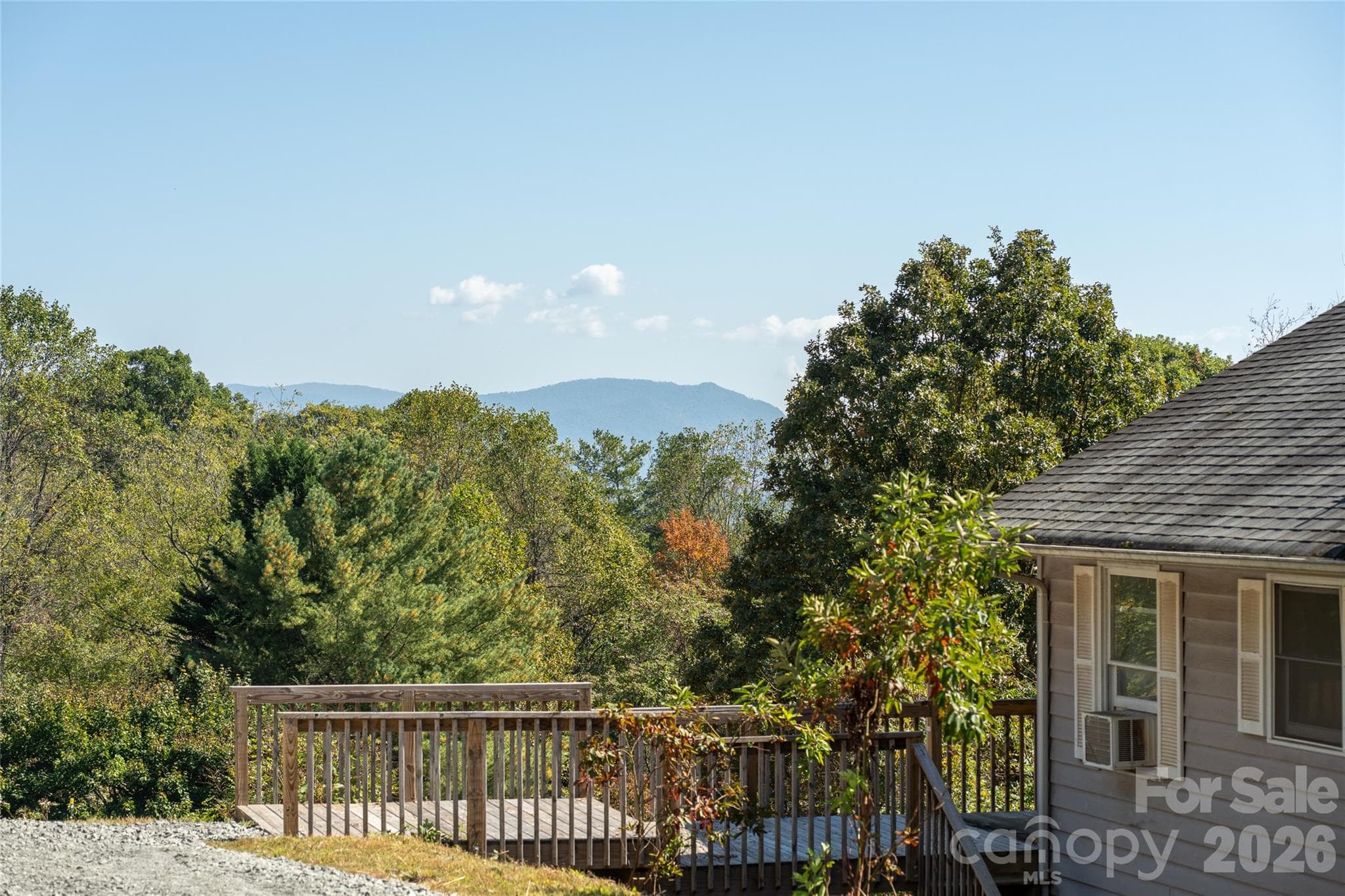 Enjoy the peaceful mountain setting and seasonal views from the deck. - 117 Spivey Mountain Road, Asheville