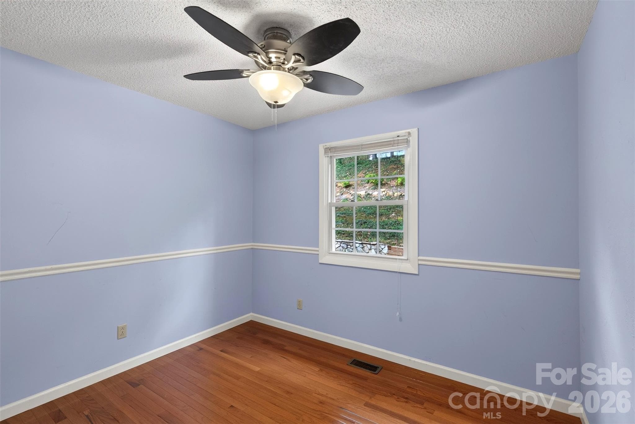 Wood Floors in this bedroom - 126 Pine Hill Drive, Swannanoa