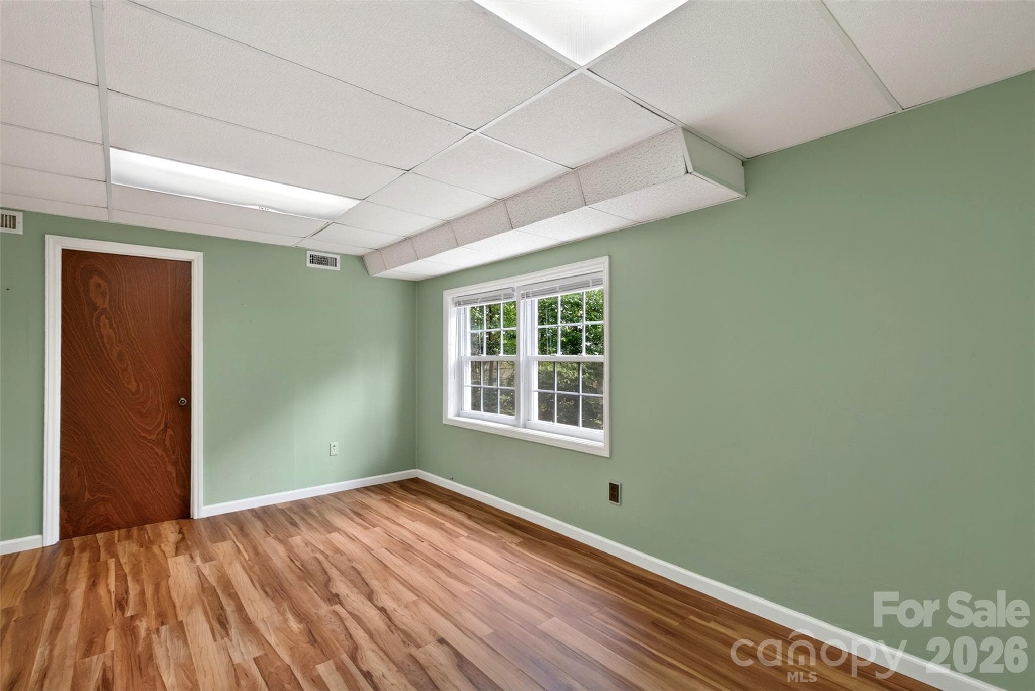 Windows provide light in basement den - 126 Pine Hill Drive, Swannanoa