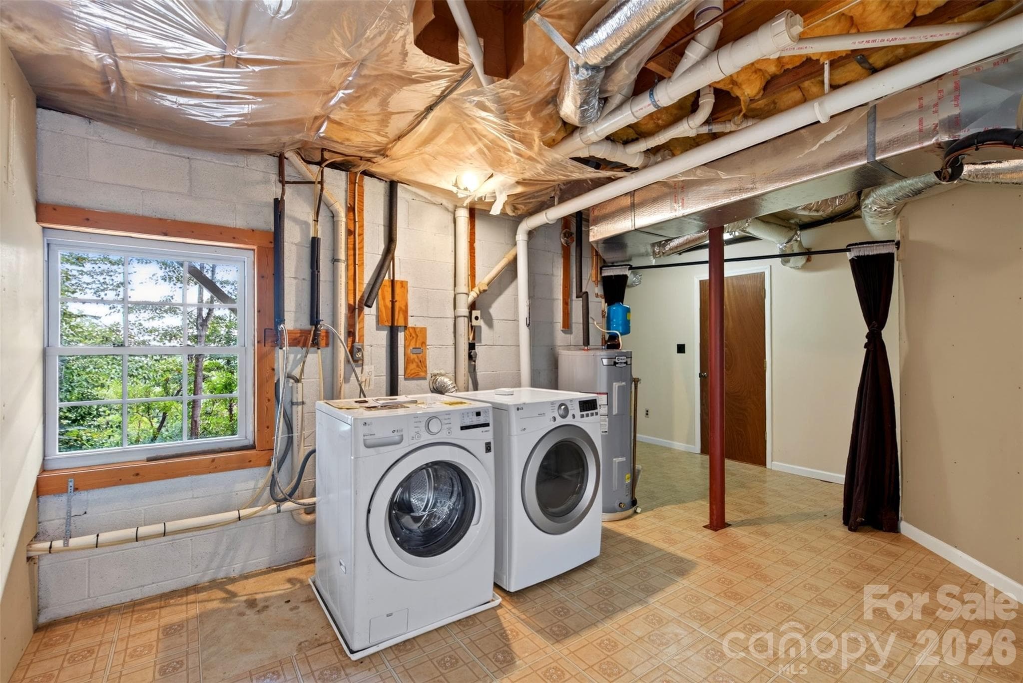 Laundry in Basement - 126 Pine Hill Drive, Swannanoa