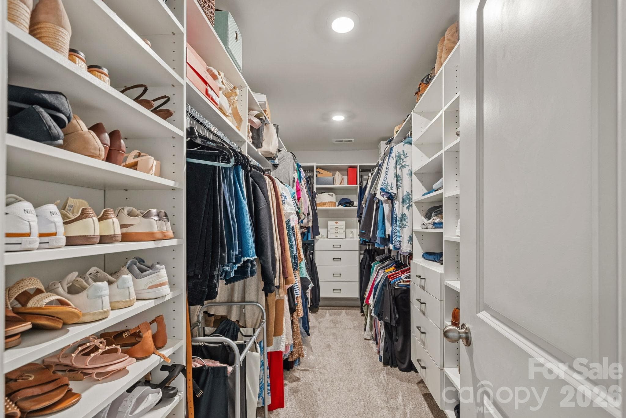 Primary Closet with California Custom Closets - 9325 Beecroft Valley Drive, Huntersville