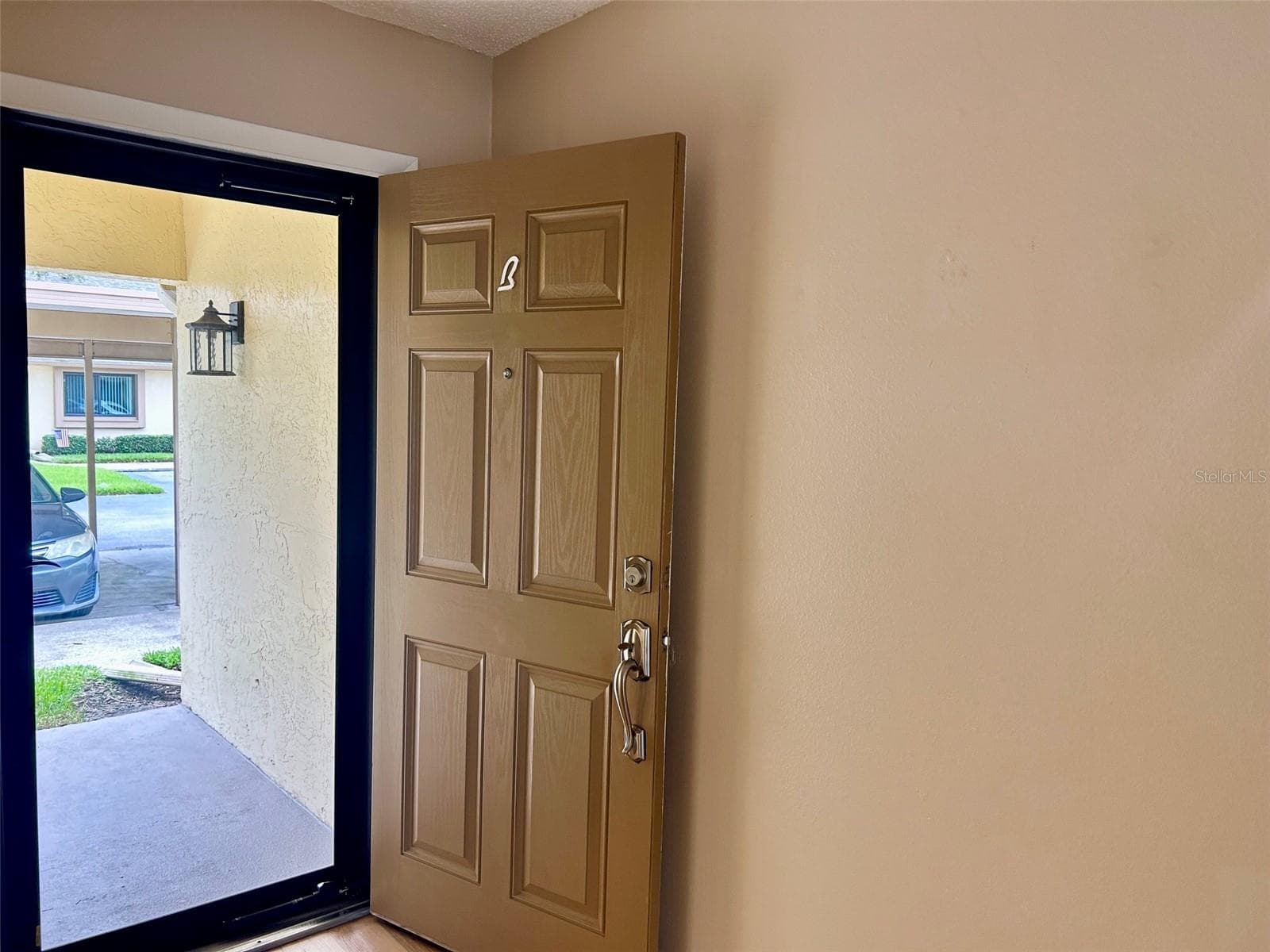Front Door With Glass Door - 2506 OAKLEAF LN #25B, CLEARWATER