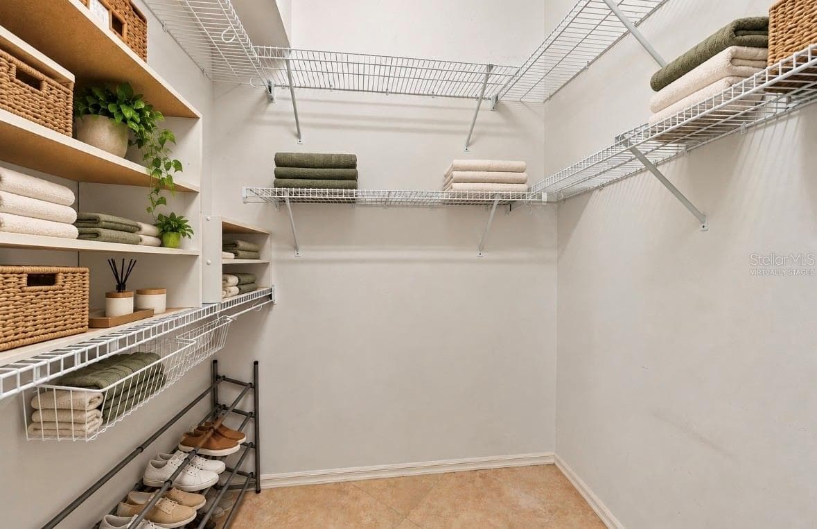 Virtually stagedSecond walk-in closet in primary bedroom - 9310 SOUCHAK DR, TRINITY