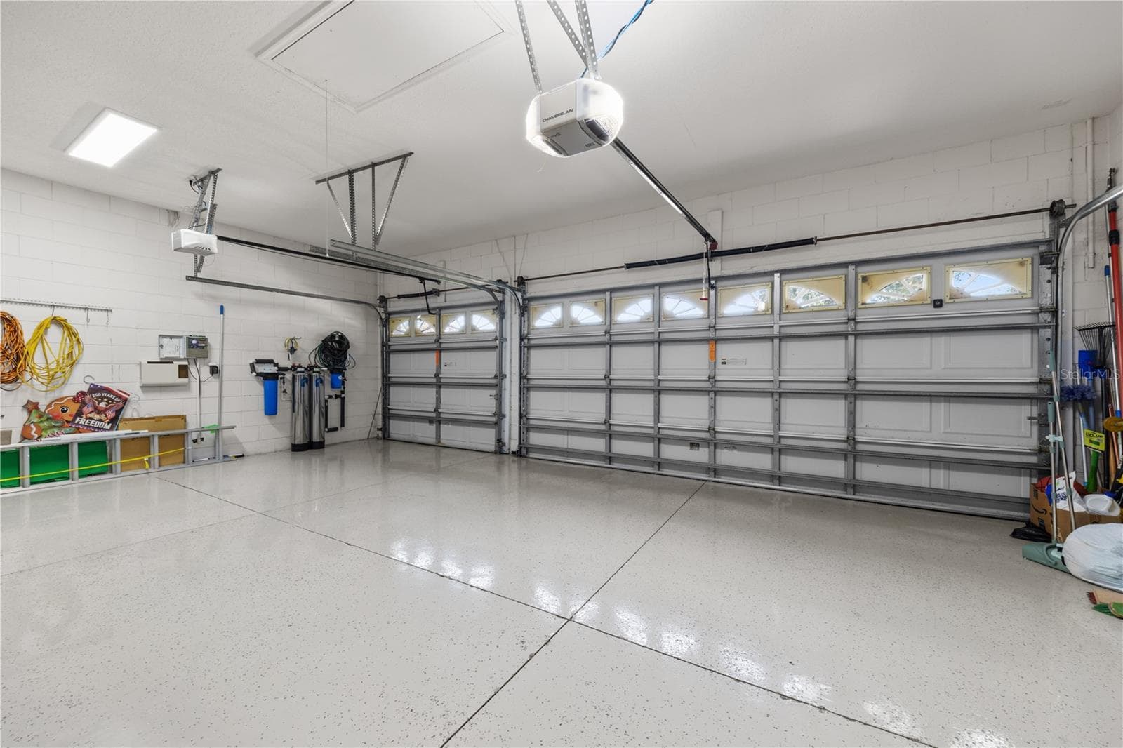 3 car garage with epoxy flooring - 4079 GREYSTONE DR, CLERMONT