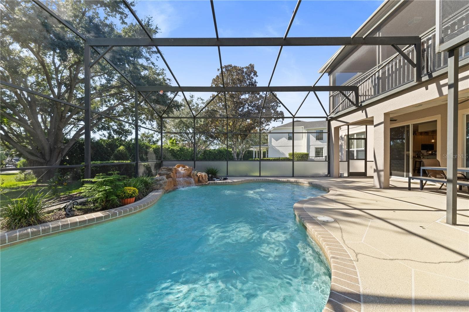 Saltwater pool with a beautiful rock waterfal - 4079 GREYSTONE DR, CLERMONT