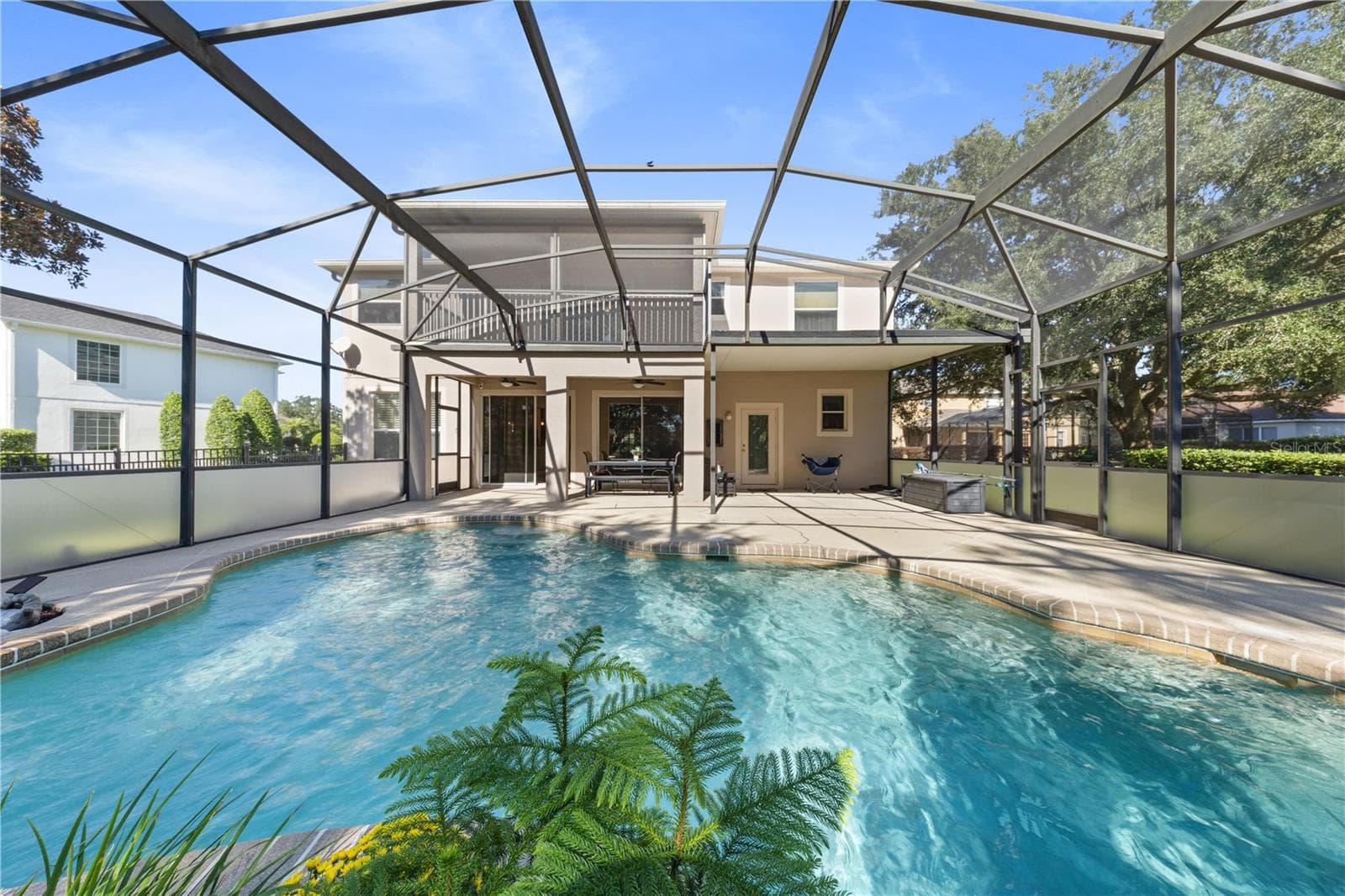 Custom-designed saltwater pool with a beautiful rock waterfal - 4079 GREYSTONE DR, CLERMONT