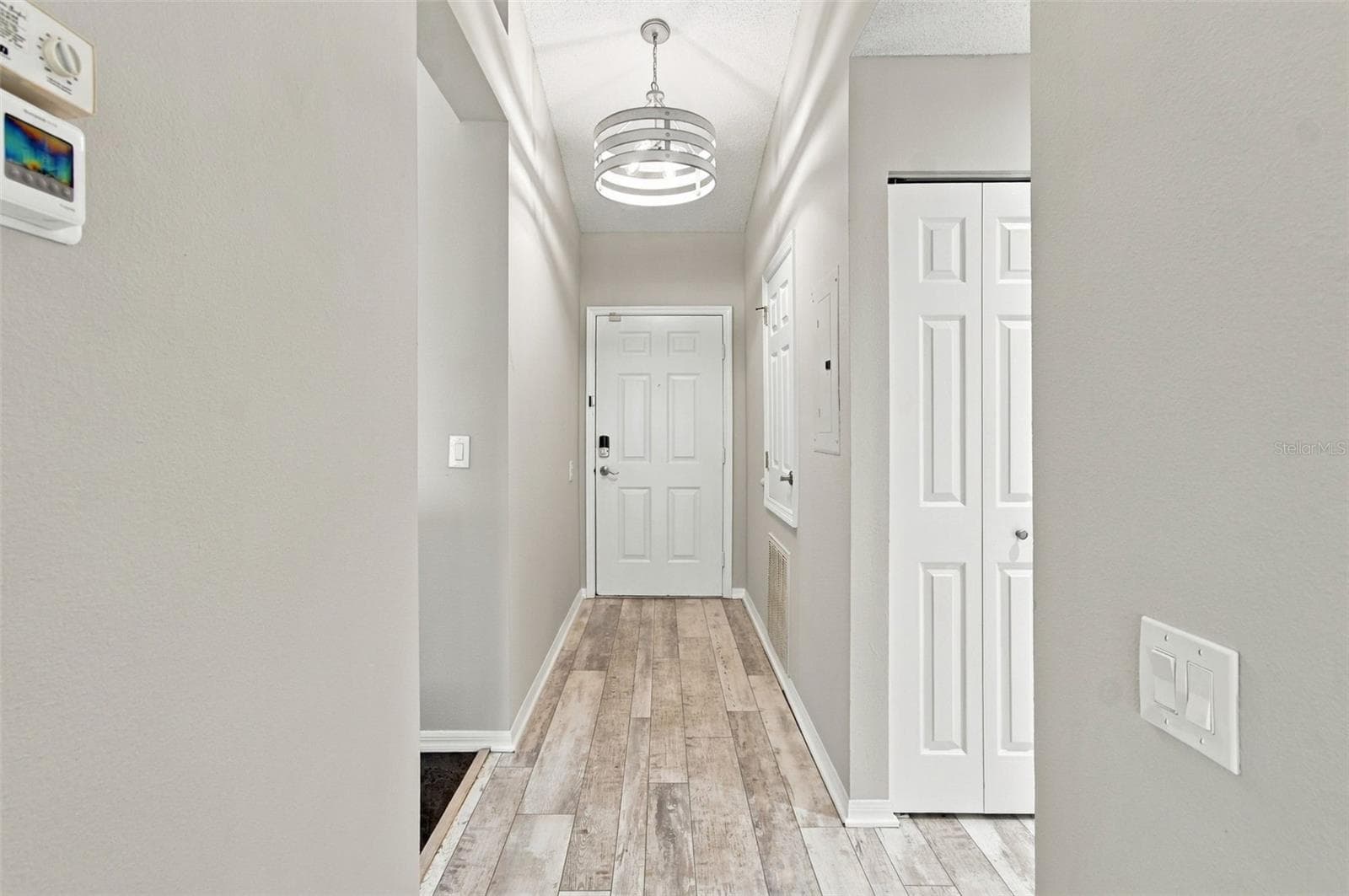 NICE FOYER AND STORAGE CLOSET ON RIGHT - 4210 CADDIE DR E #202, BRADENTON