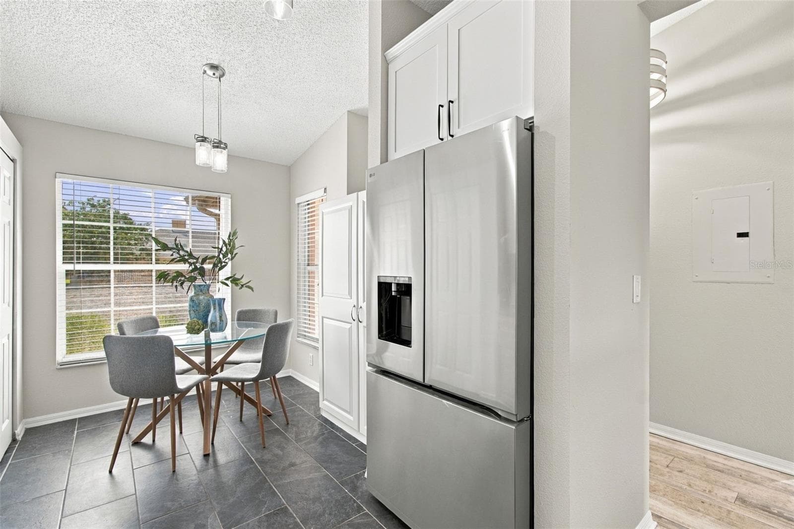 BREAKFAST NOOK AND LOVE THIS NEW FRIDGE! - 4210 CADDIE DR E #202, BRADENTON
