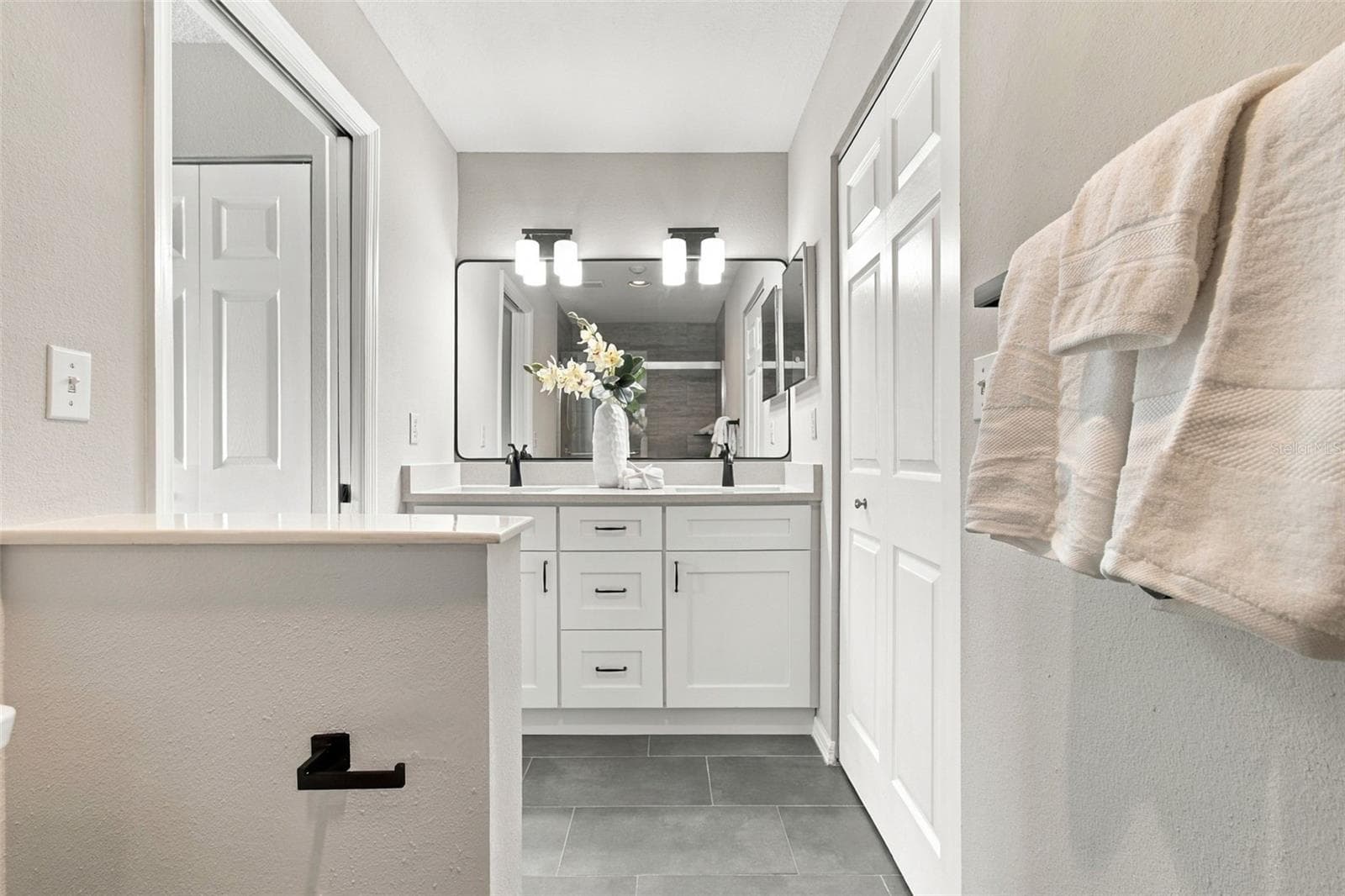Tastefully updated Primary Bath w Custom Dual Vanity - 4210 CADDIE DR E #202, BRADENTON