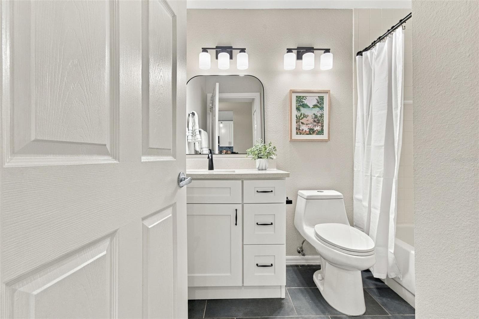 Quartz Countertop, New Faucet, MIrror, Light and Fixtures - 4210 CADDIE DR E #202, BRADENTON