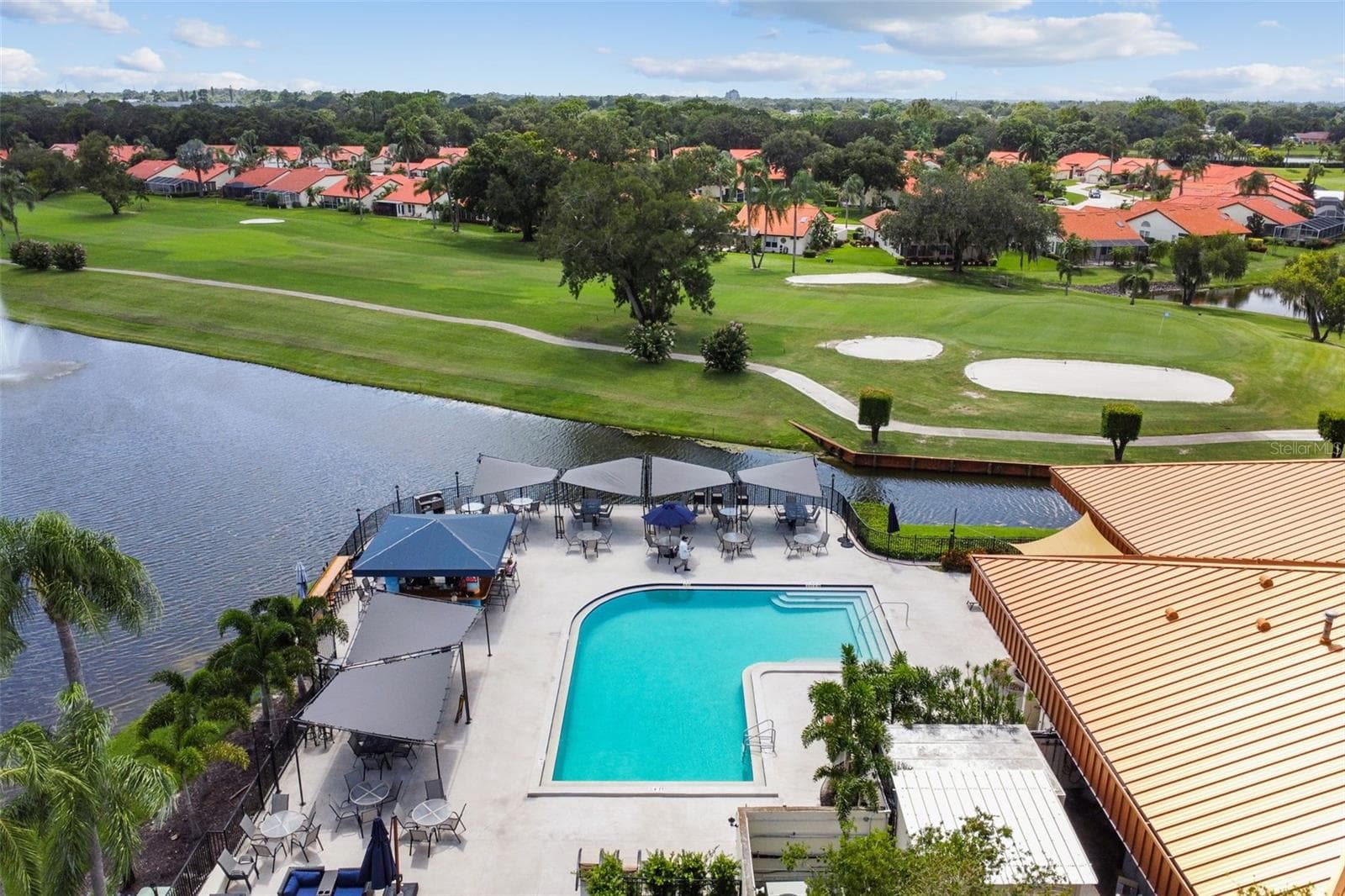 Community Pool with Tiki Bar - 4210 CADDIE DR E #202, BRADENTON