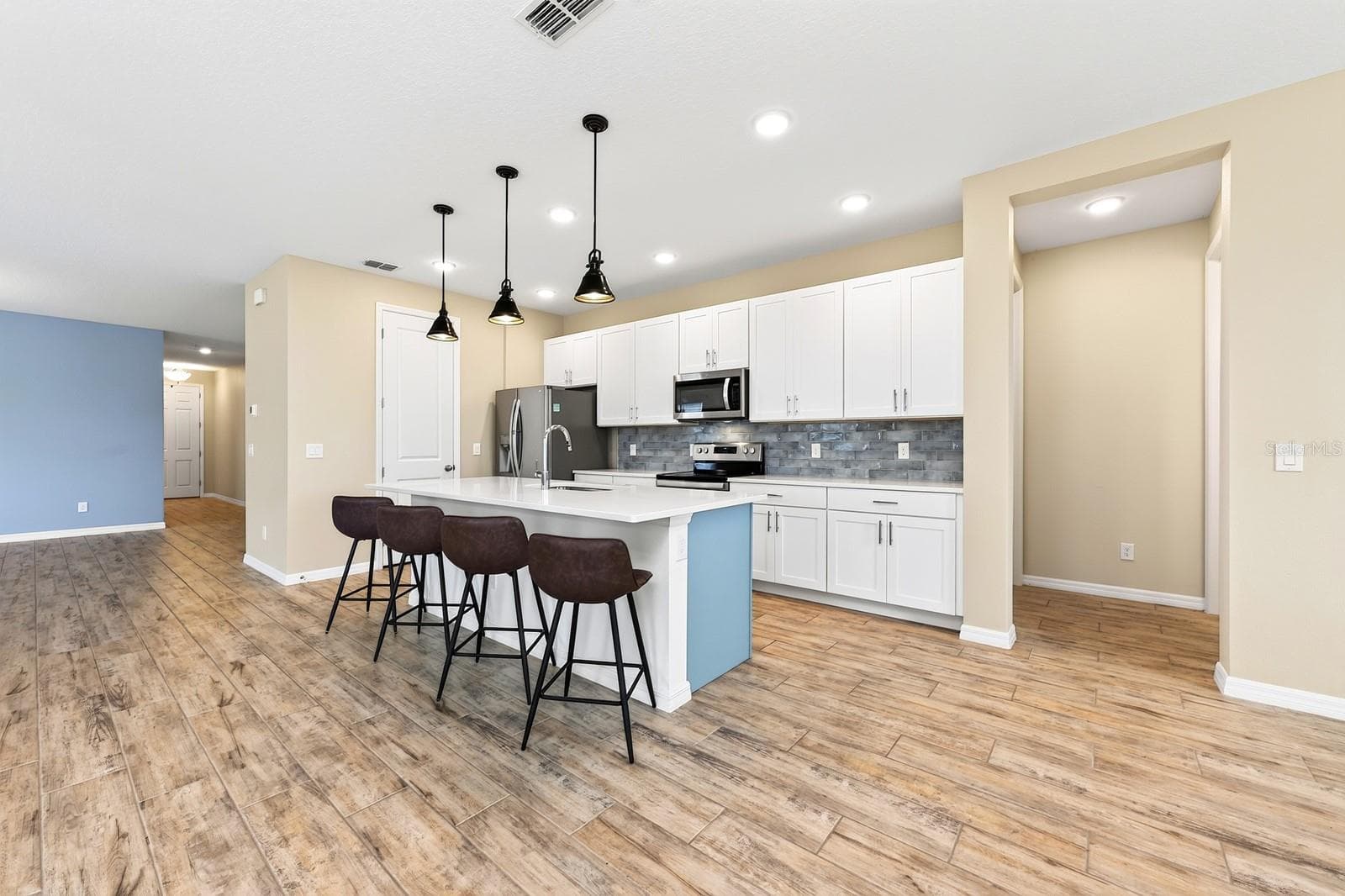 What a space to cook and entertain in. Perfect for barstools and extra seating. - 880 LIVESTOCK LOOP, ST CLOUD