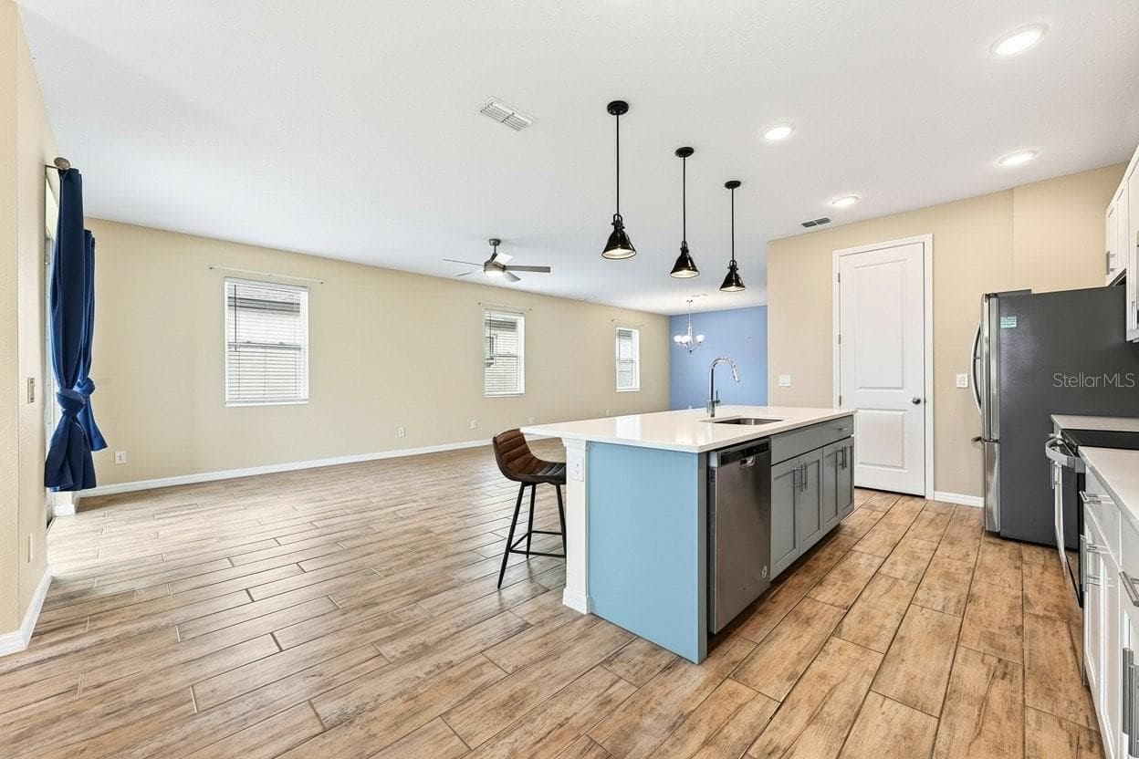 **Virtually Edited** Living - Dining - Kitchen - 880 LIVESTOCK LOOP, ST CLOUD