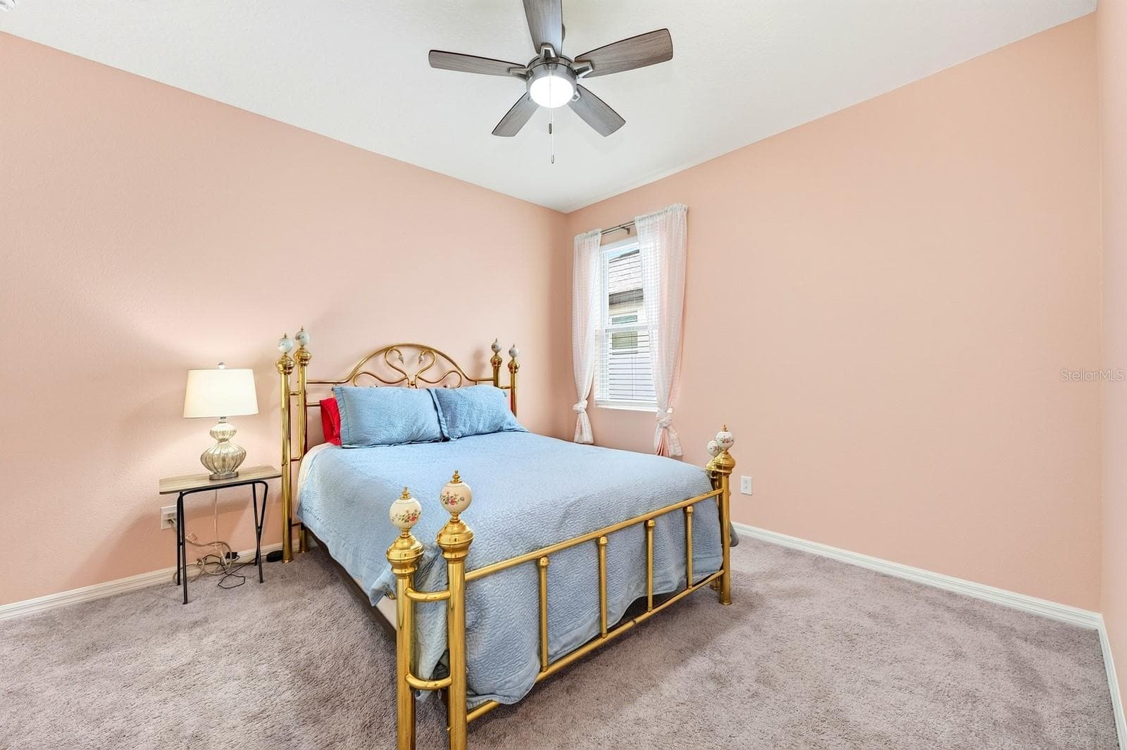 Perfect secondary bedroom with carpet and a ceiling fan - 880 LIVESTOCK LOOP, ST CLOUD
