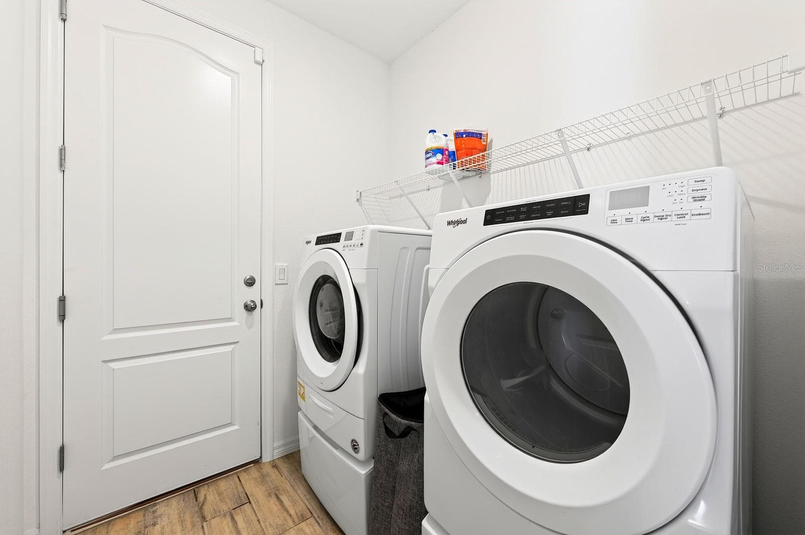 Spacious laundry room (Washer & Dryer INCLUDED) with a shelf for easy storage - 880 LIVESTOCK LOOP, ST CLOUD