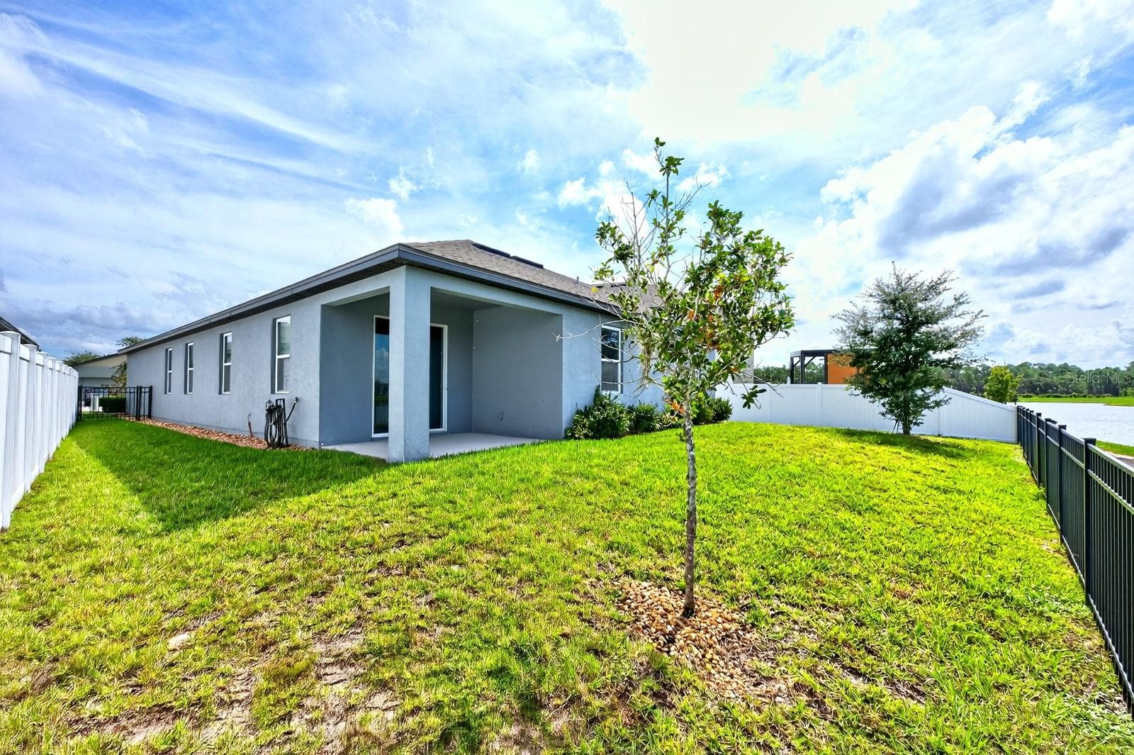 A blank space for you to create your backyard oasis - 880 LIVESTOCK LOOP, ST CLOUD
