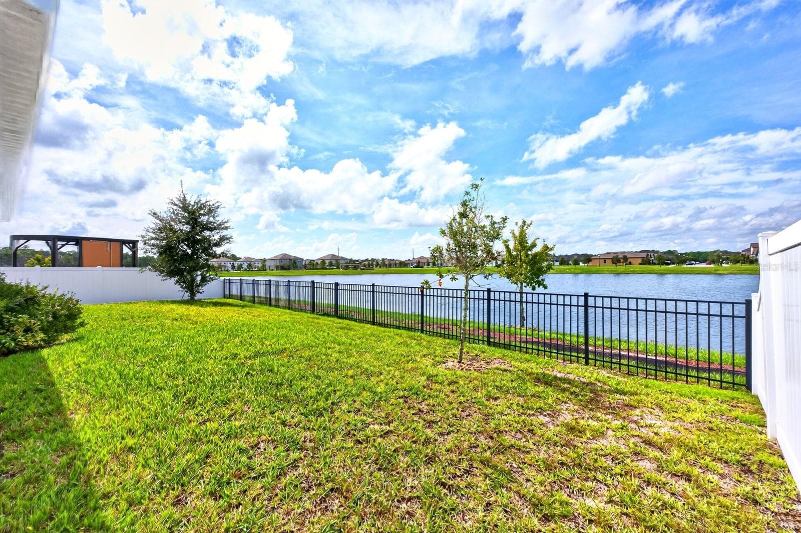 Your gorgeous view while relaxing on your back porch after a long day - 880 LIVESTOCK LOOP, ST CLOUD