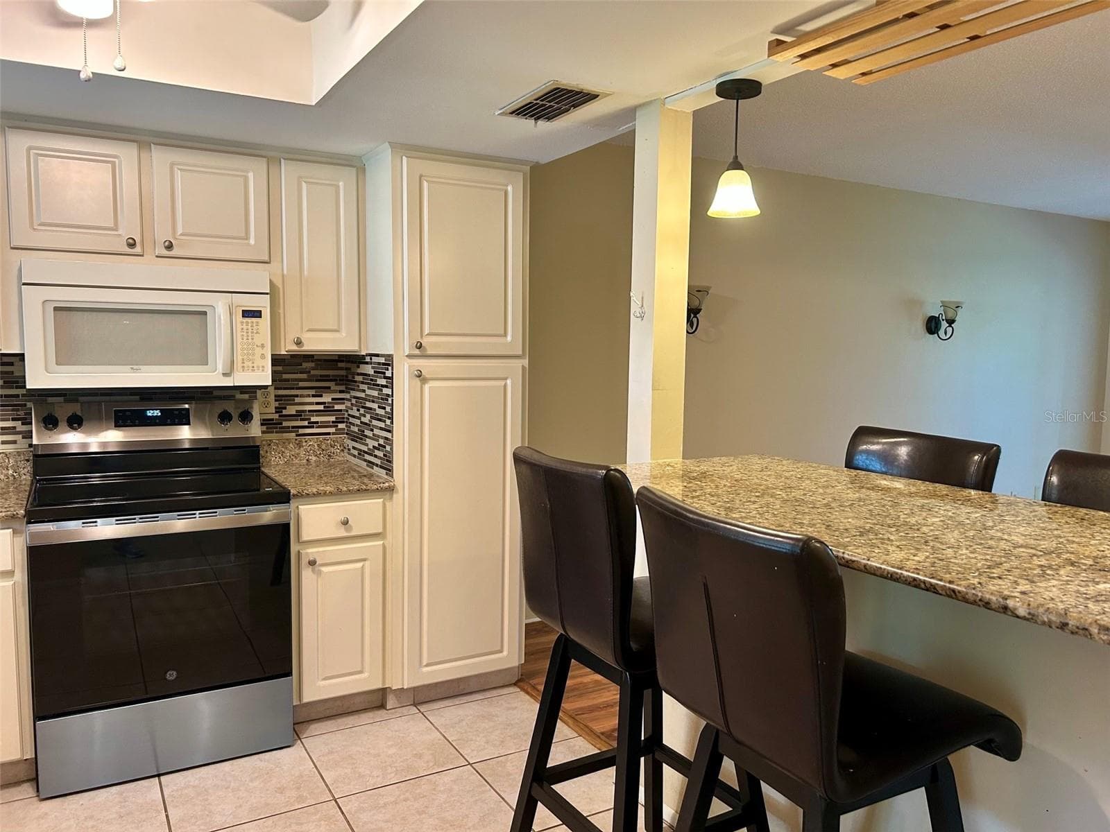 Kitchen With New Stove - 2529 OAKLEAF LN #30C, CLEARWATER