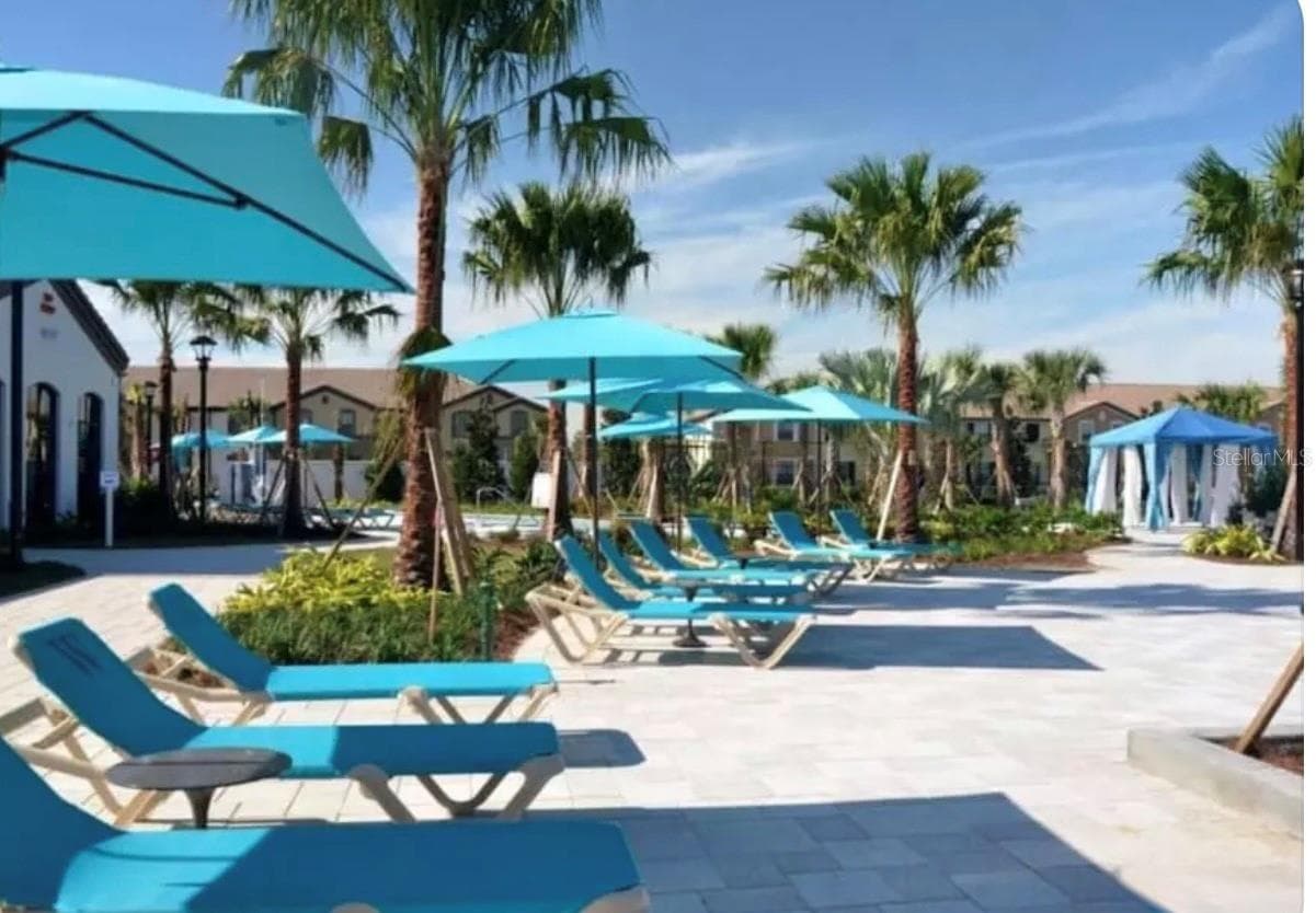 RESORT POOL AND LOUNGE AREA - 8843 GENEVE CT, KISSIMMEE