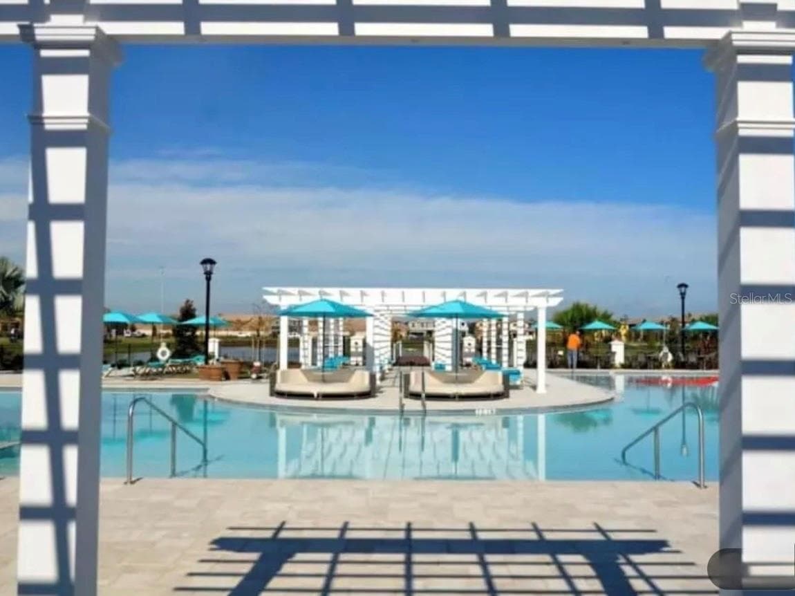 RESORT POOL AND LOUNGE AREA - 8843 GENEVE CT, KISSIMMEE