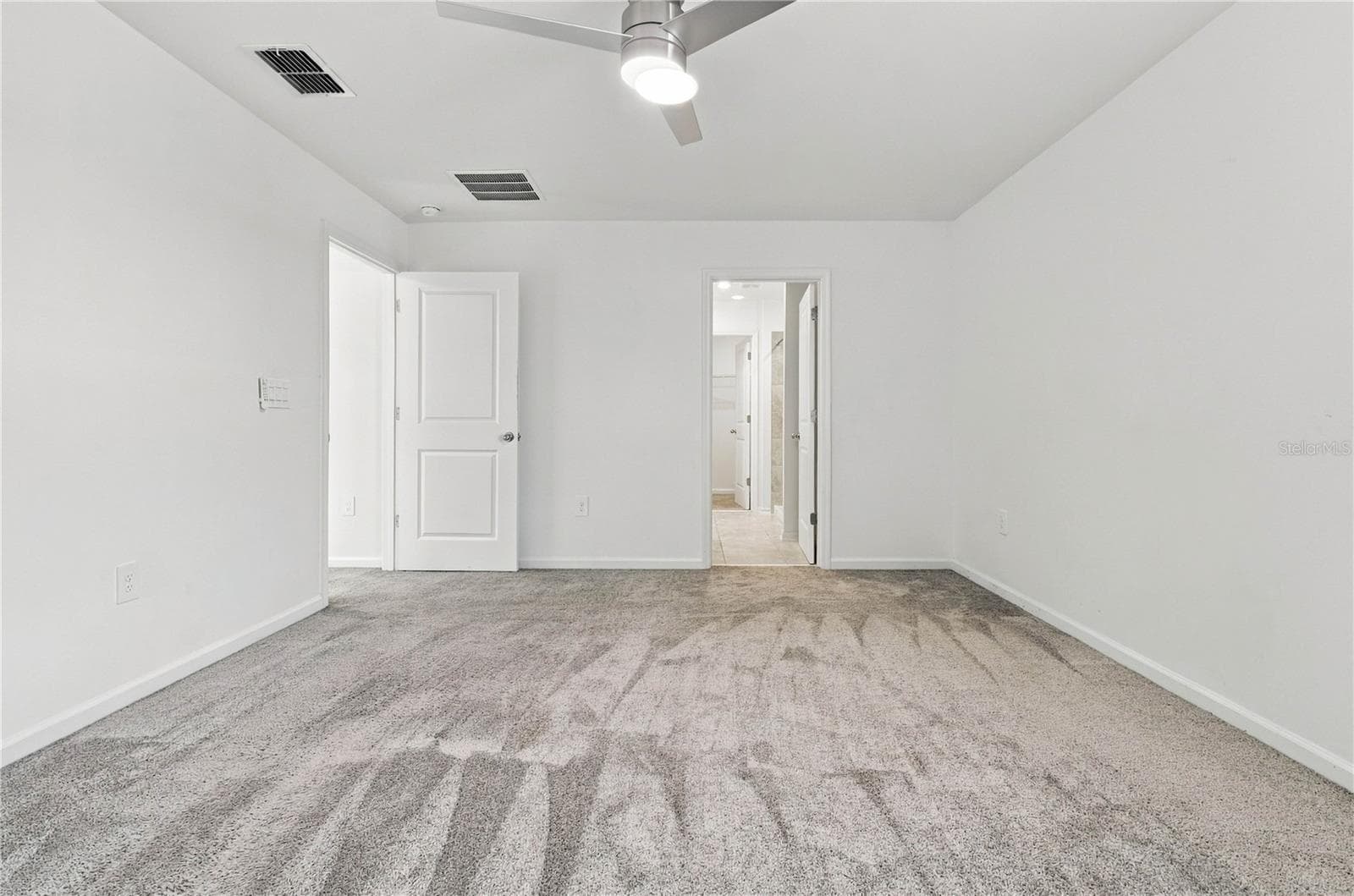 Primary Bedroom with En-Suite Access - 997 HAROLD PASS, WINTER HAVEN