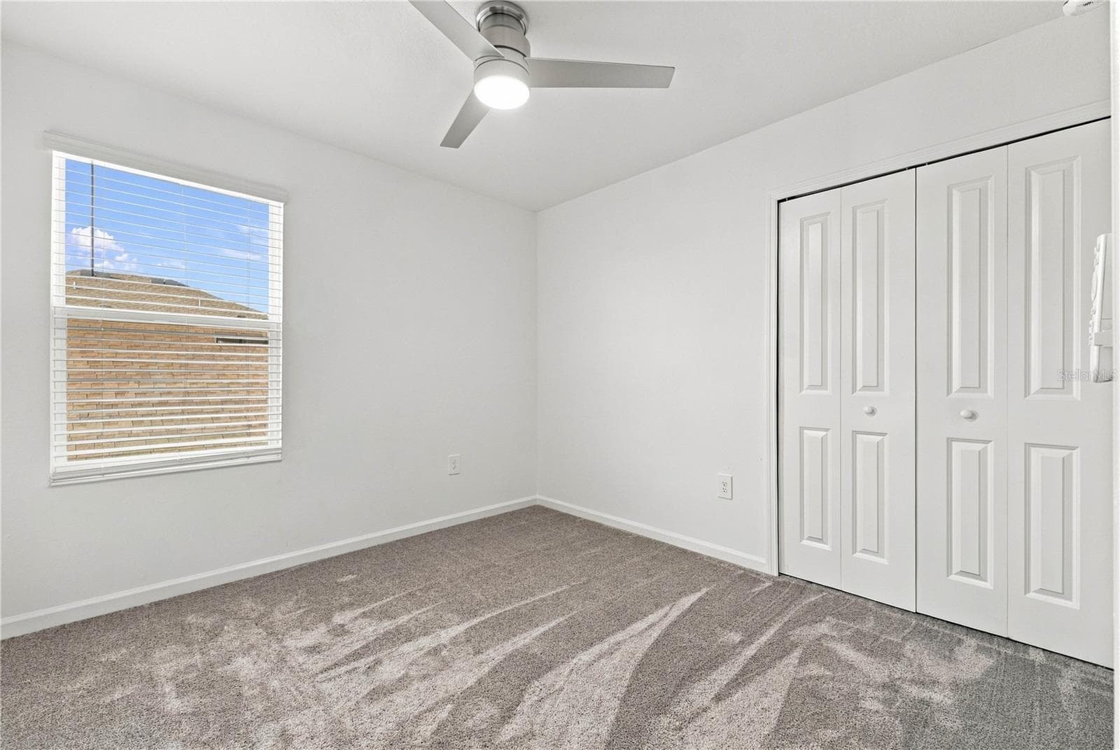 Bedroom with Double-Door Closet - 997 HAROLD PASS, WINTER HAVEN