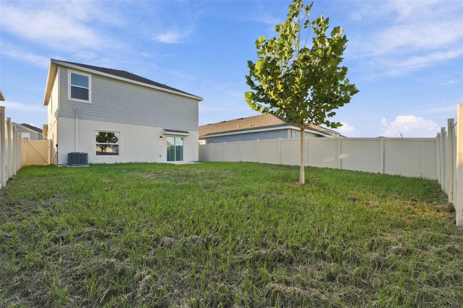 Rear Exterior with Fenced Backyard - 997 HAROLD PASS, WINTER HAVEN
