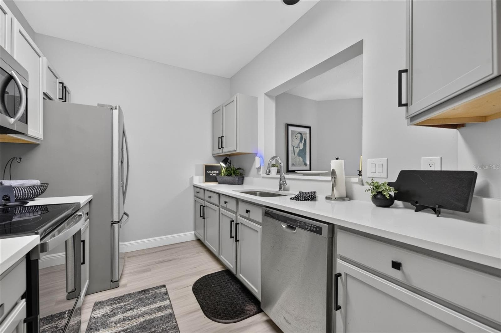 Kitchen counters, sink and dishwasher - 4849 CYPRESS WOODS DR #1302, ORLANDO