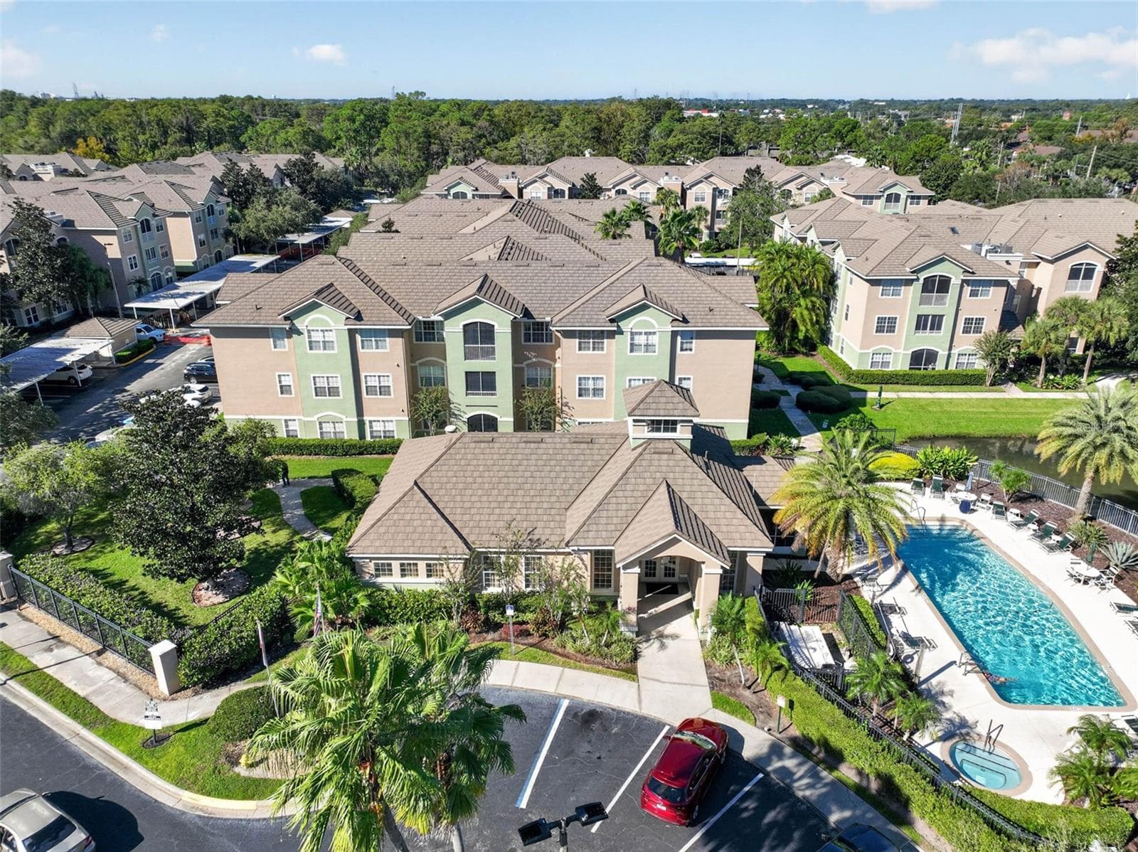 Aerial of clubhouse, pool and building - 4849 CYPRESS WOODS DR #1302, ORLANDO