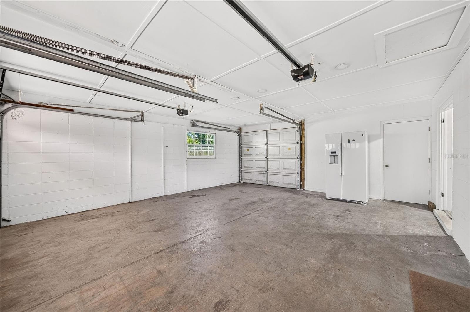 3rd garage door - leads to backyard - 641 SHERWOOD DR, ALTAMONTE SPRINGS