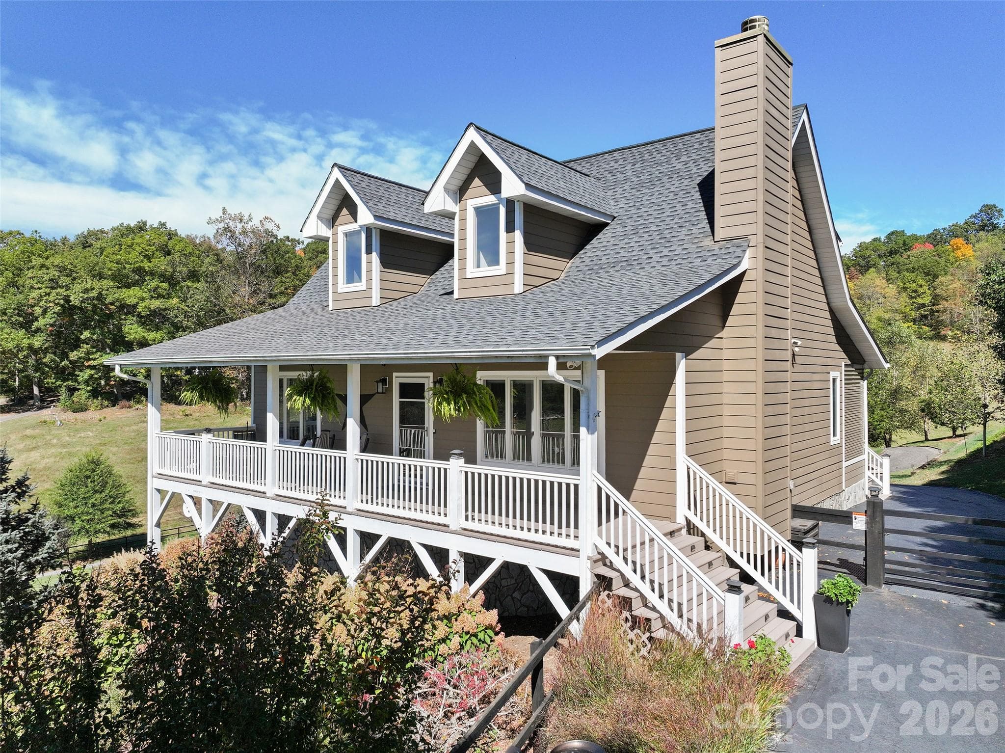 Electric Circular Driveway gate to the right of the house. - 43 Eagle Ridge, Clyde