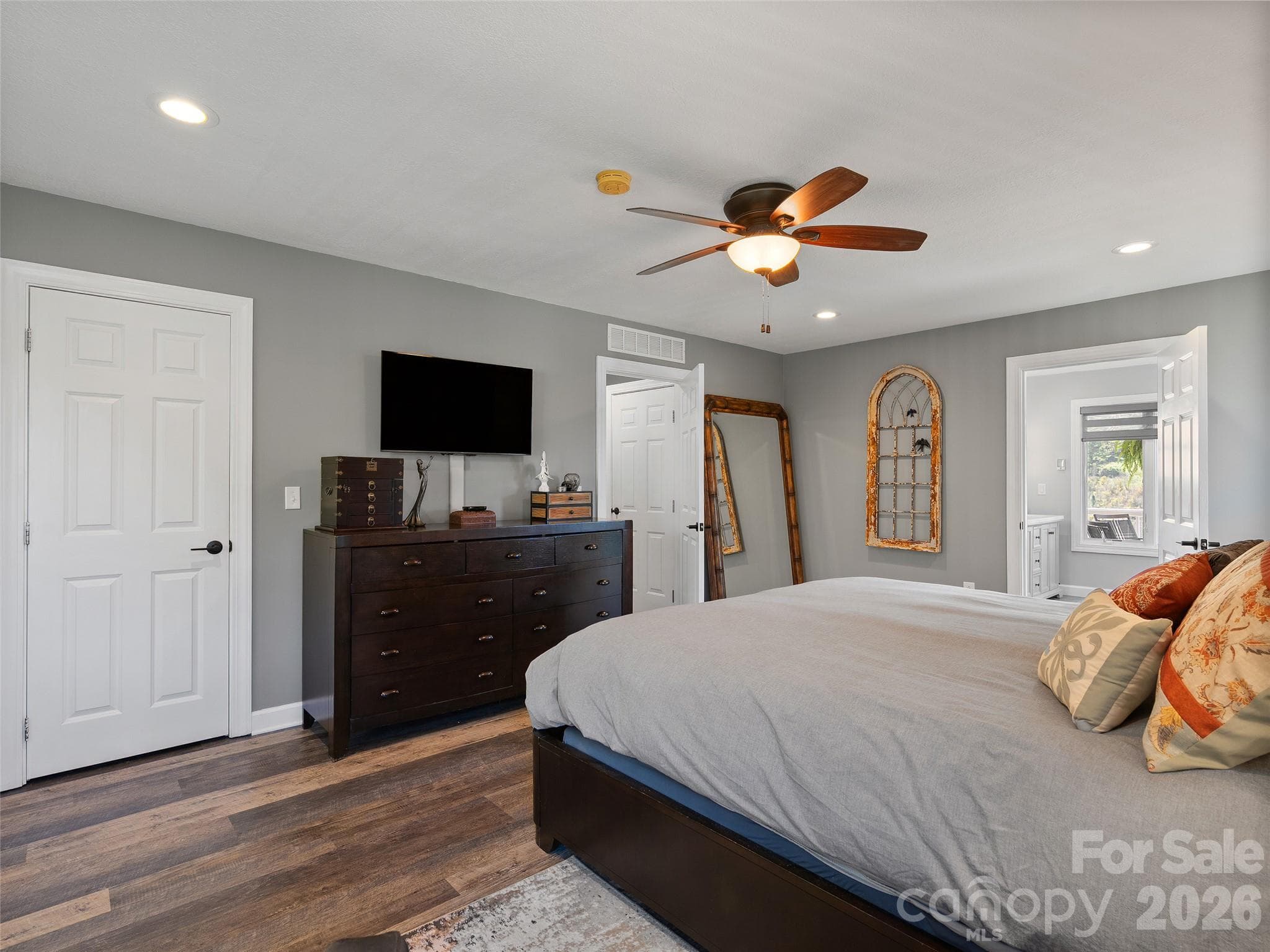 Spacious Primary Bedroom with luxury vinyl plank floor. - 43 Eagle Ridge, Clyde
