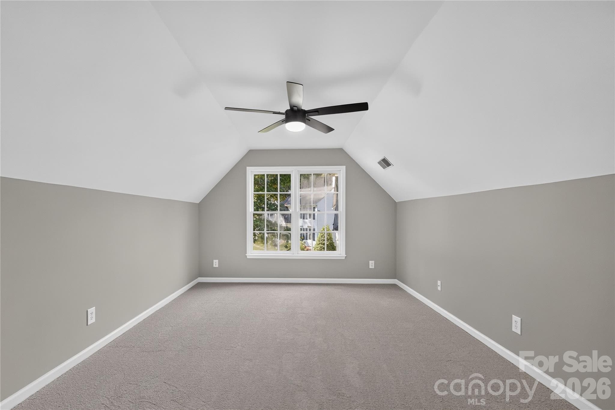 4th bedroom/Bonus Room is perfect for a home office, gym, media room, or guest space.  Also includes under-the-eaves storage. - 4711 Beech Crest Place, Charlotte