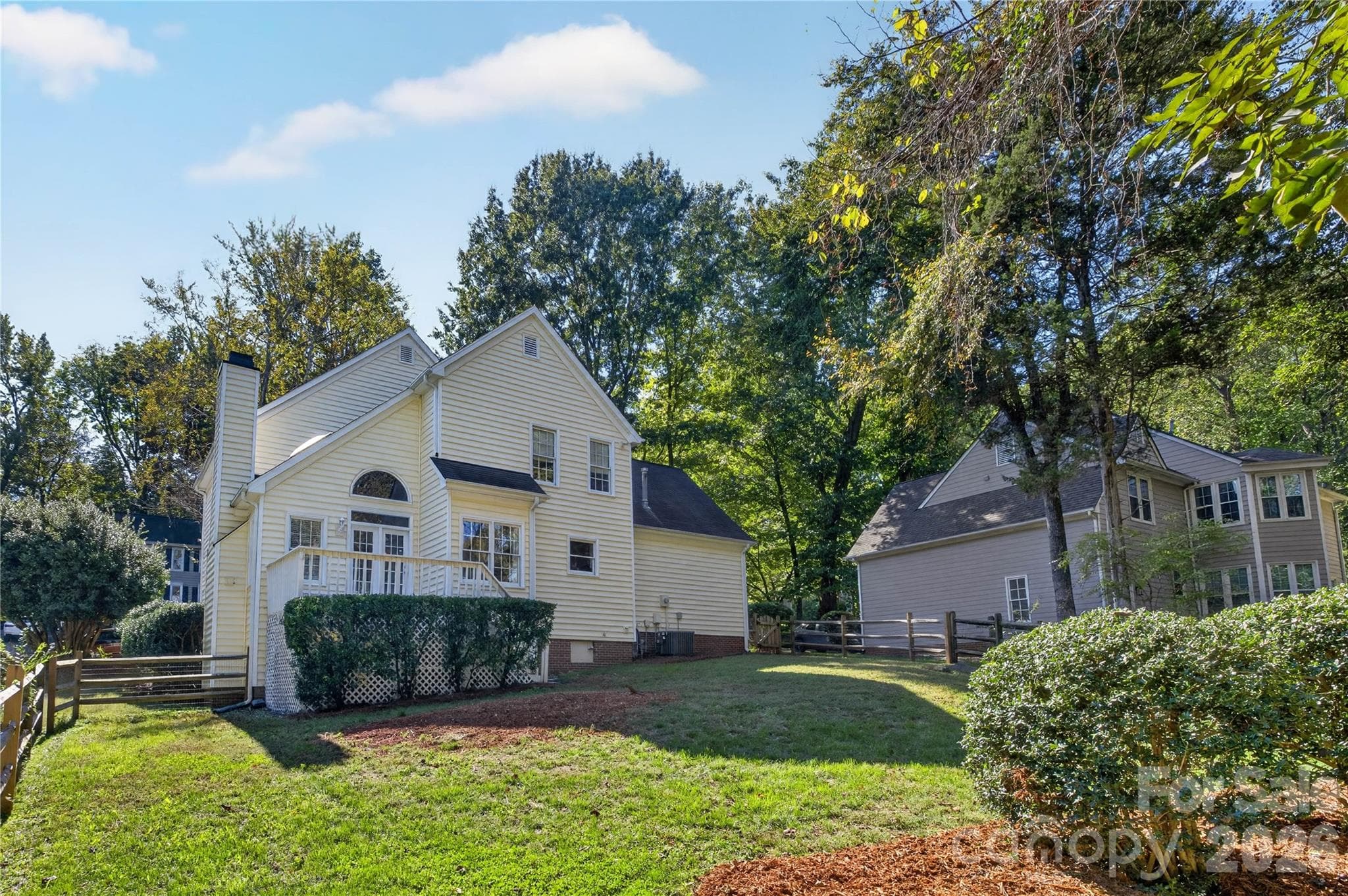 Backyard offers beautiful views from the deck and direct neighborhod greenway access. - 4711 Beech Crest Place, Charlotte