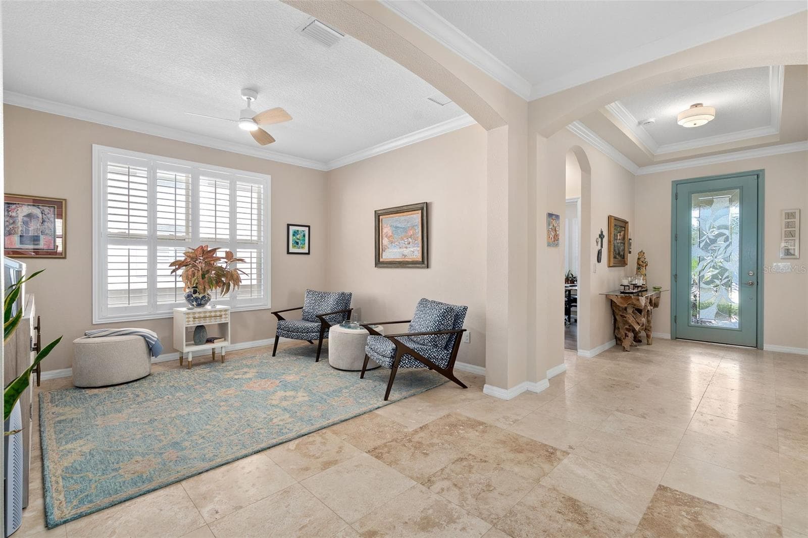 Flex space can be utilized as an Office/Den/Study or a Sitting Room. The Foyer is in the background. - 1038 TIMBERVALE TRL, CLERMONT