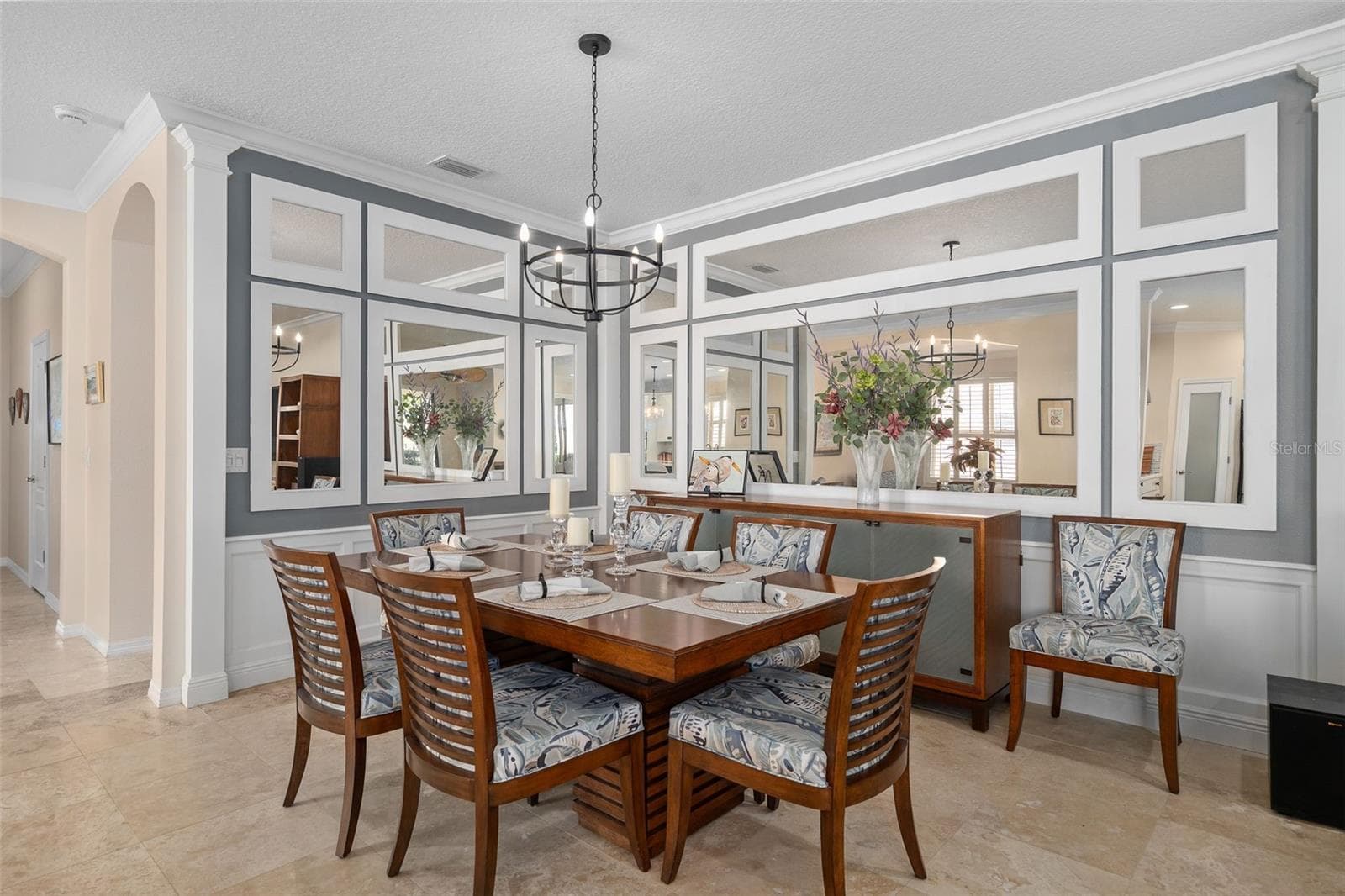 Dining Room with Custom Wall/Mirror treatment. - 1038 TIMBERVALE TRL, CLERMONT