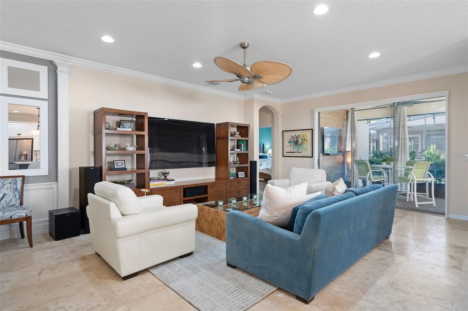 There is direct access to the Screened Lanai from the Family Room - 1038 TIMBERVALE TRL, CLERMONT